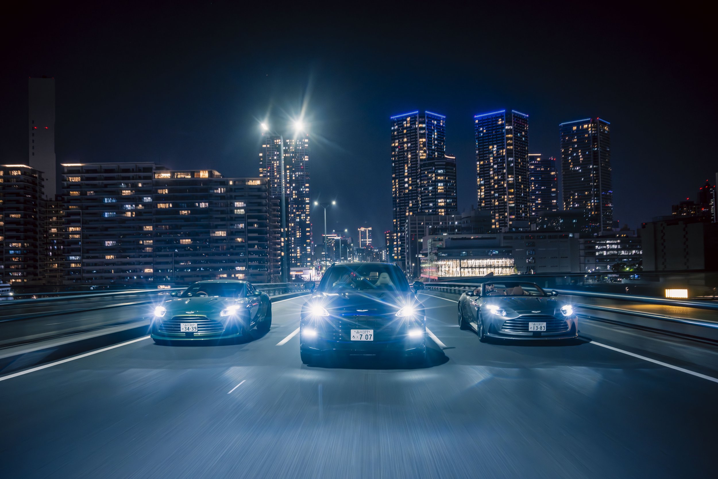 AstonMartinmodelsinToykonightscape.jpg