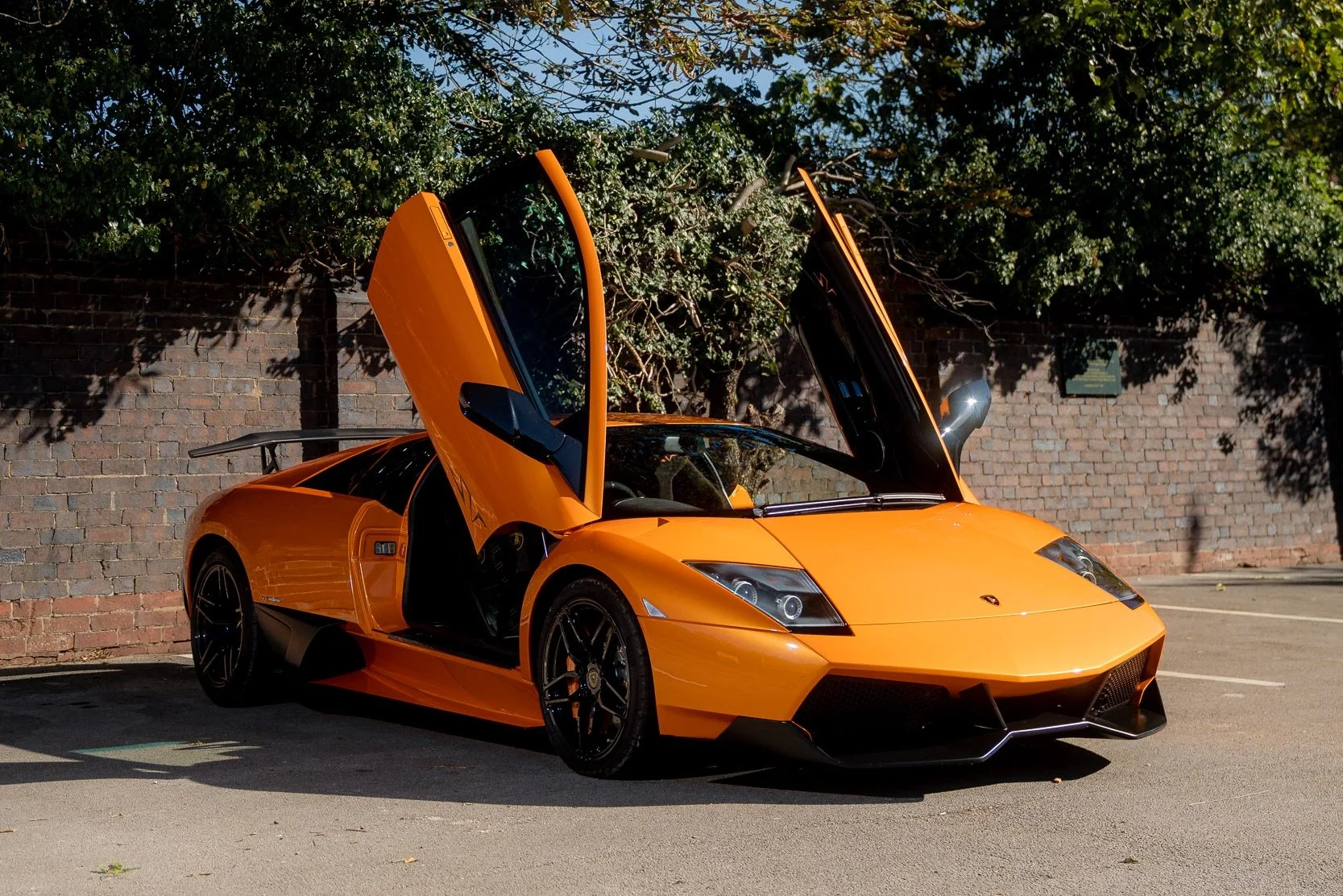 2009 Lamborghini Murciélago LP670-4 SV doors up.jpg