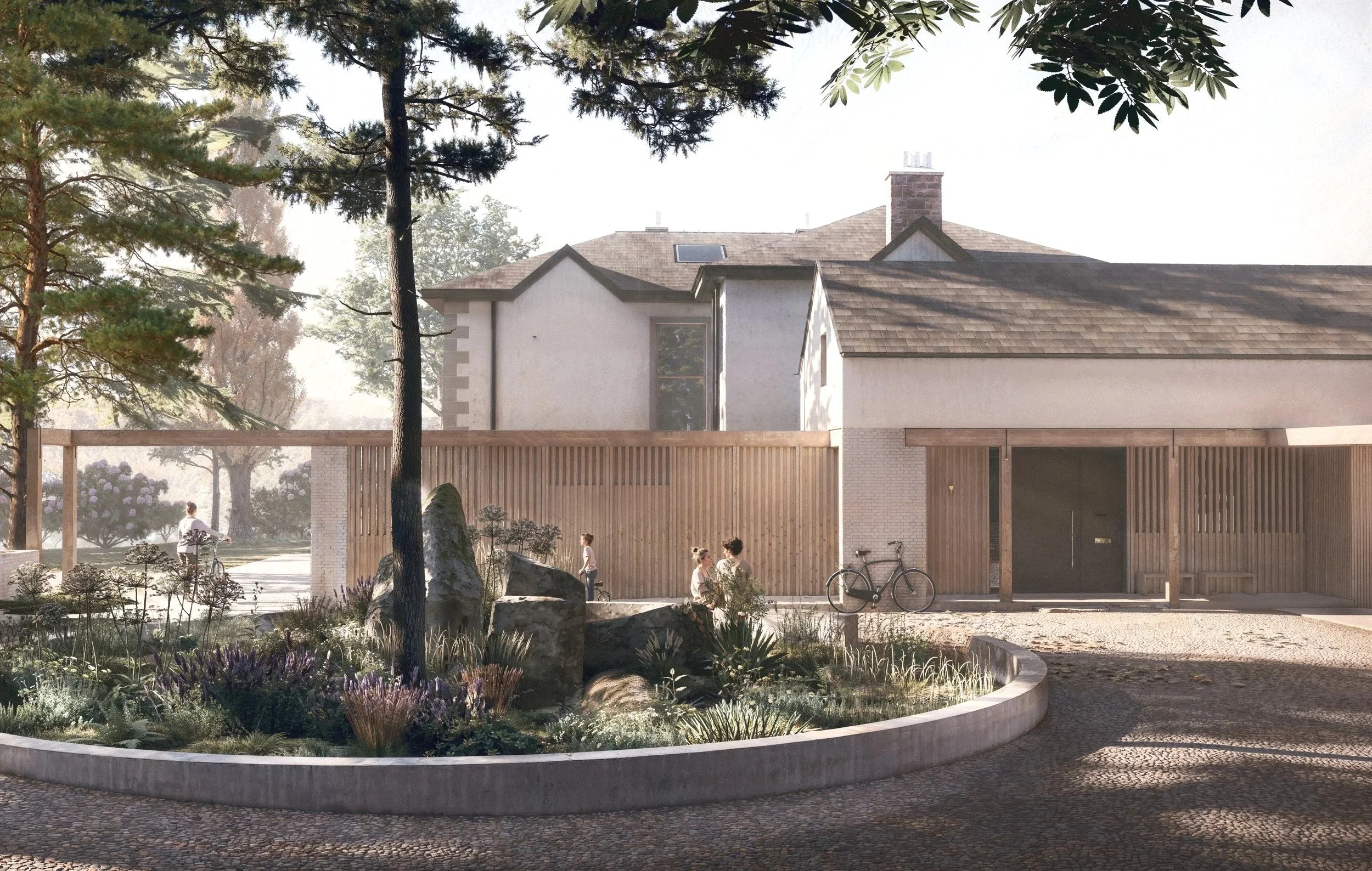A house with a modern design featuring a pitched roof, a large window, and a stone chimney. There is a wooden fence in front of the house, and the yard has various plants, flowers, and rocks. Several children are playing outside, and there are bicycl