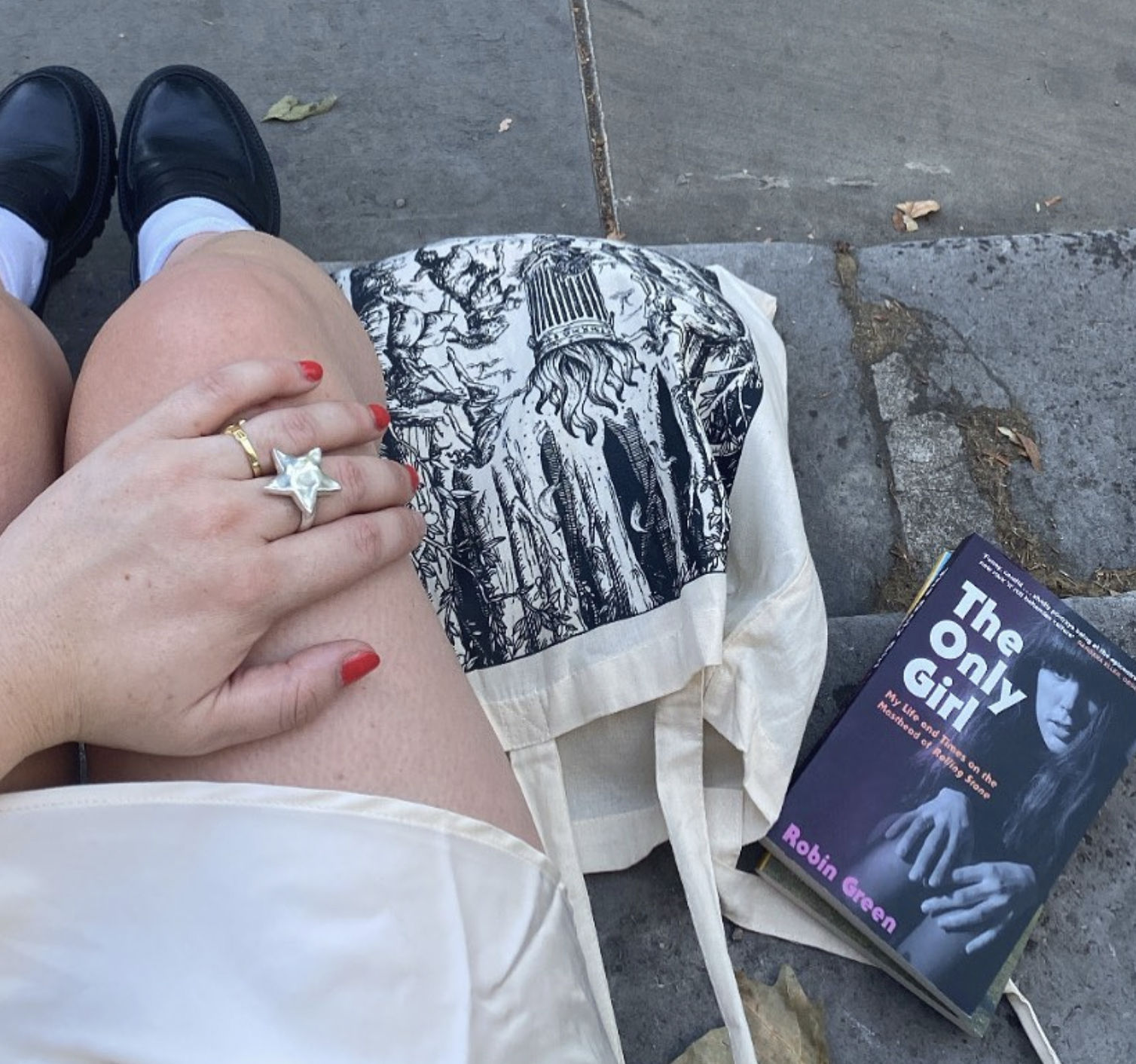 Esther with her Tommy tote & current read