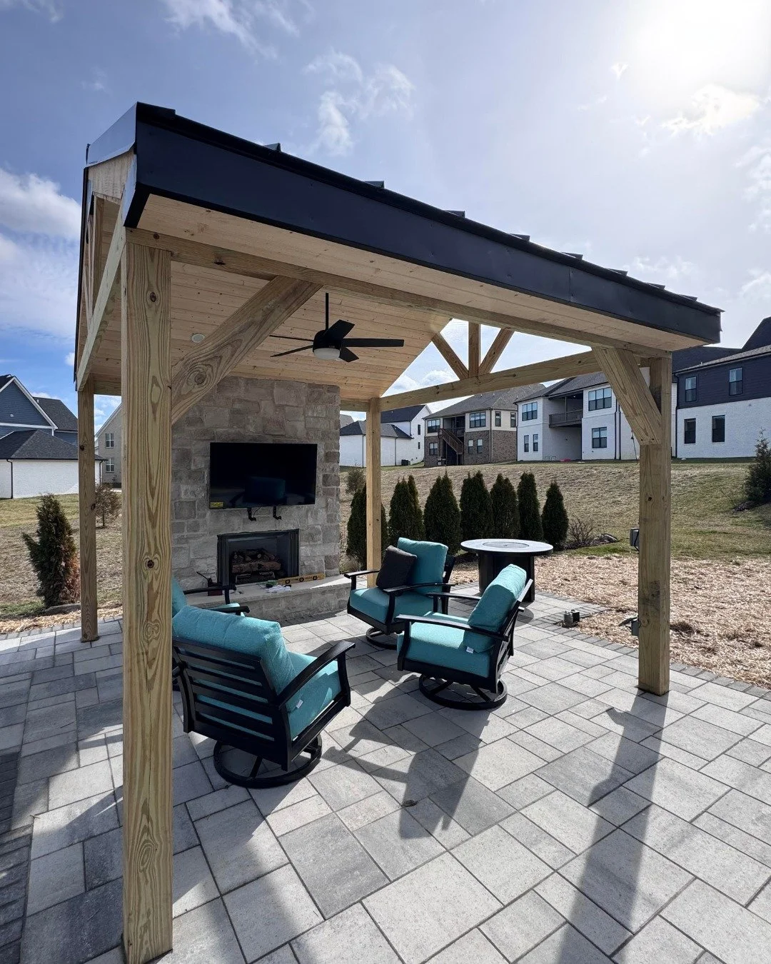 Game on overhead.  Fire on below.  Nobody's checking the time or worried about the weather in this space.  This, my friend, is a home improvement win all around!