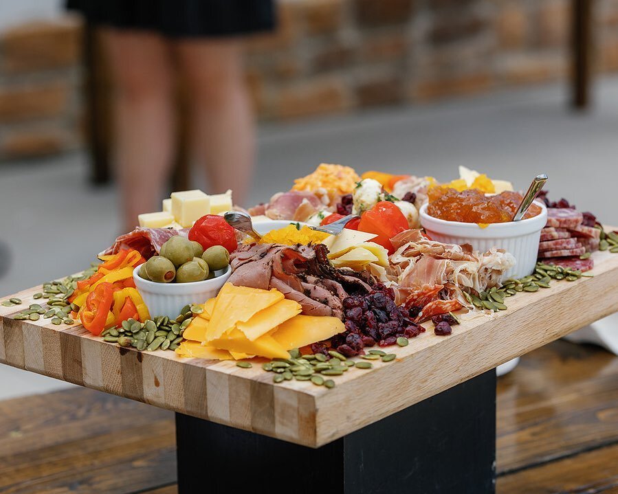 Keep your guests snacking by adding a grazing board to your catering order! The amazing team at @roots_catering are always creating something special! 

Photography: @kathybeaverphotography 

#circlemfarmevents #farmwedding #ncfarmwedding #farmhousew