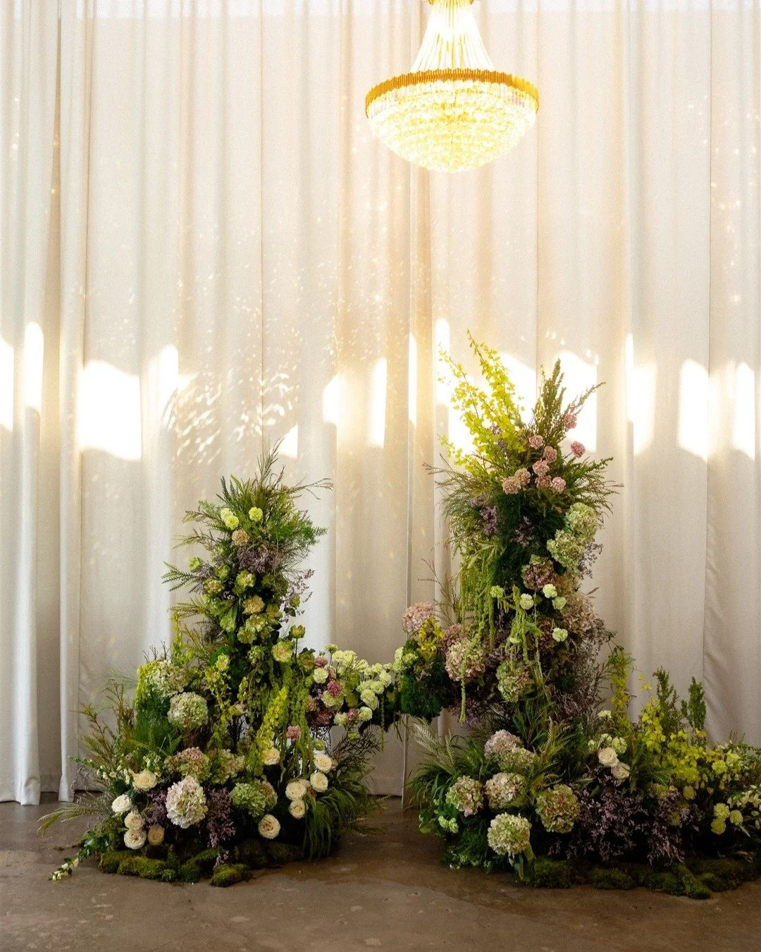 Dreamy florals + natural lighting = a romantic ceremony || 
The Casey combines elegance and warmth, sophistication and confidence. 
Photography: @candleandquill
Planner: @studioahevents
Florals: @lepetitbloom