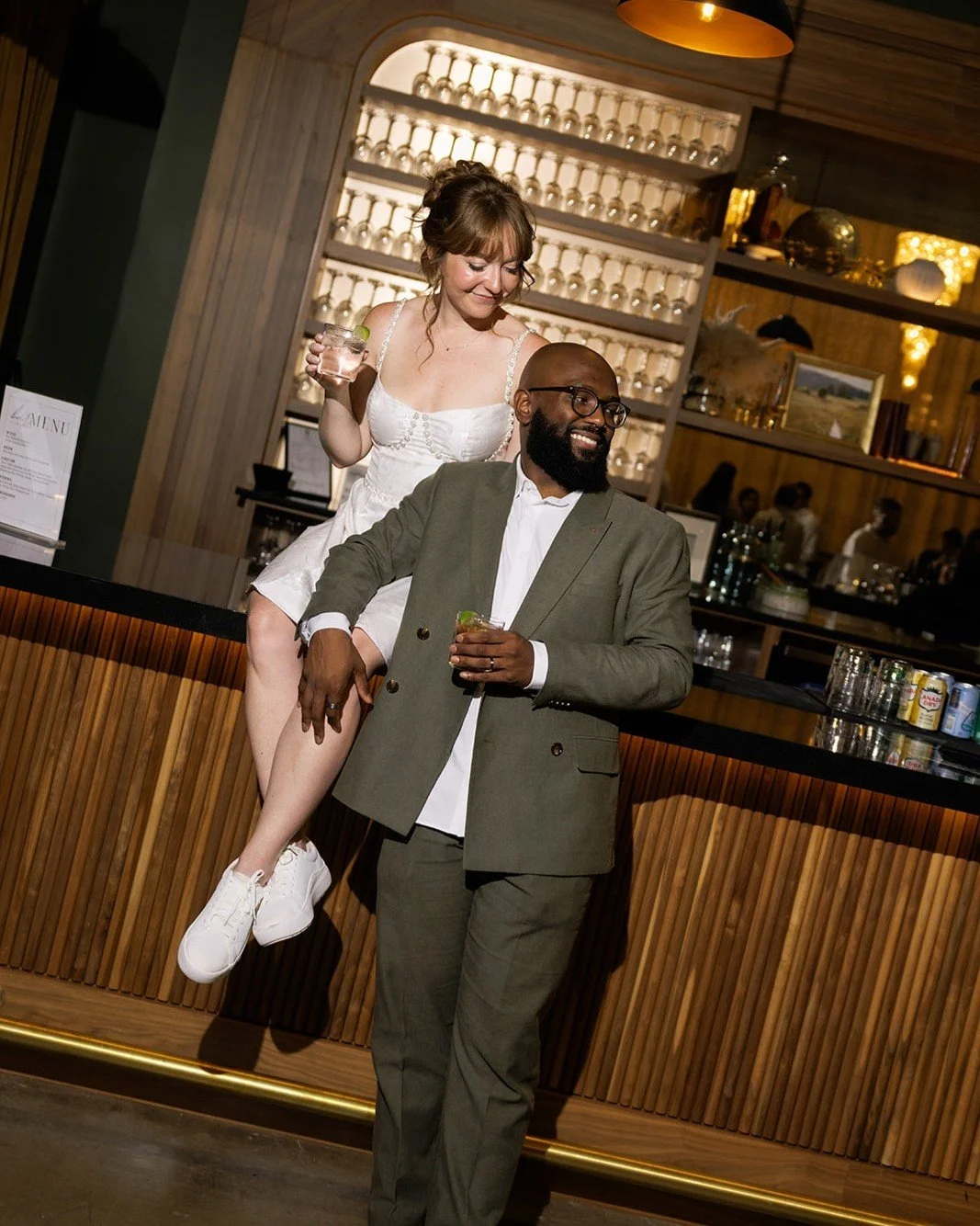 Drink in hand, love and laughter in the air✨|| We love to see our clients unique twist on couples portraits throughout our space. 
Photography: @fontanalane
Planner: @emeraldandelm.events