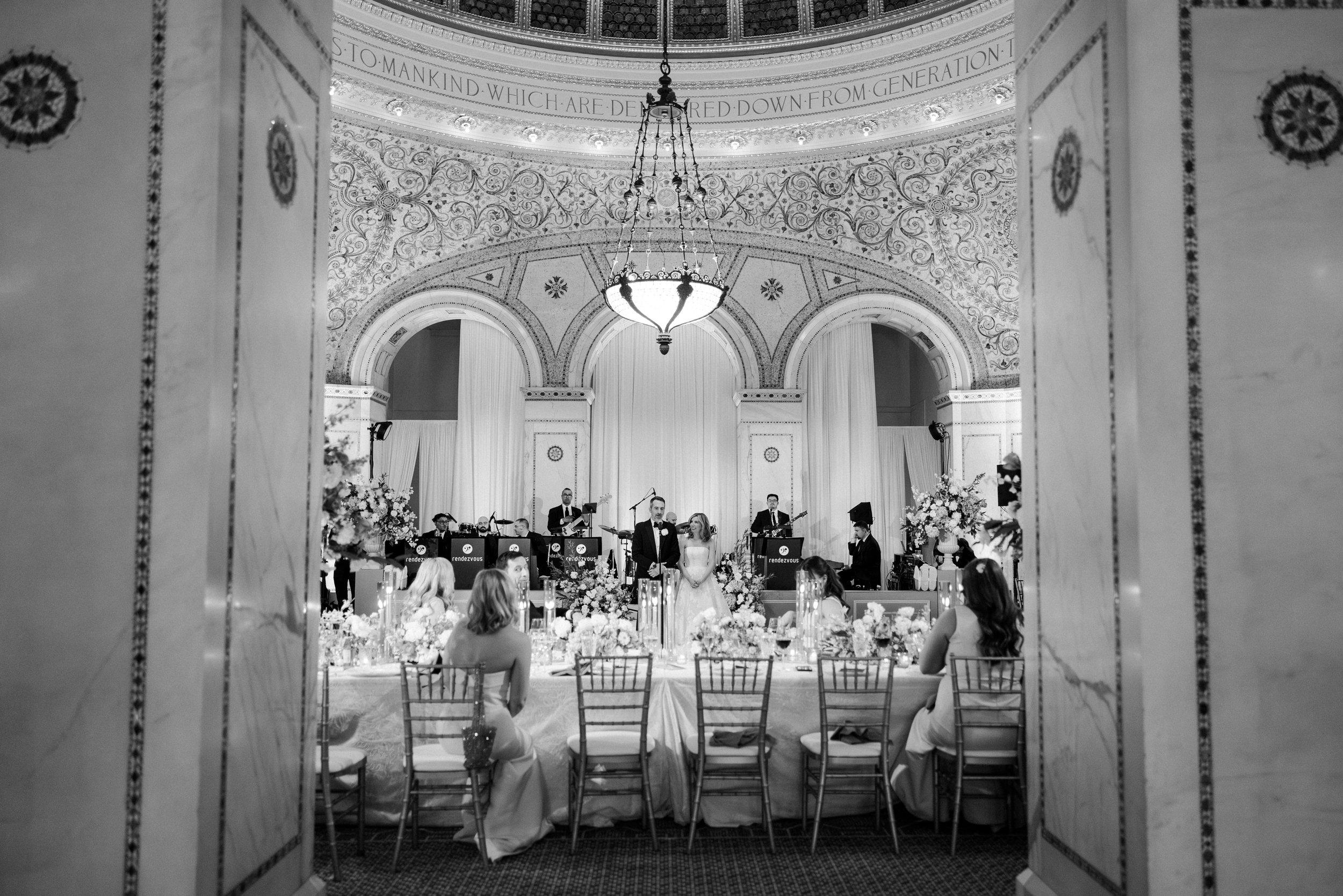 Black and white image of a Chicago Cultural Center wedding reception in the Preston Bradley Hall