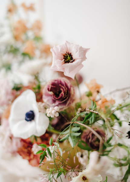 Michigan couples therapy - image of floral arrangement in brass vase in pastel tones