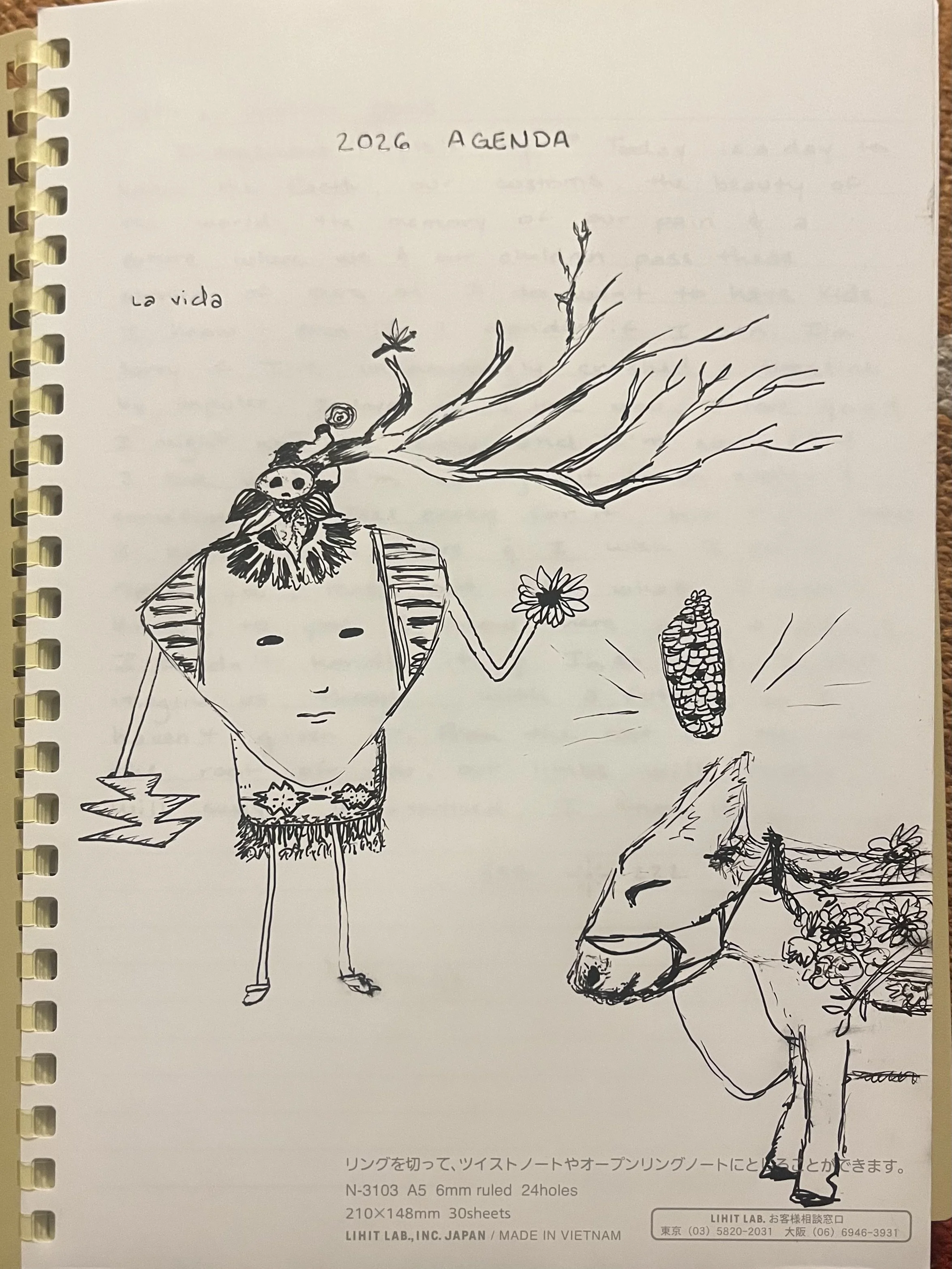 This pen and paper sketch entitled 'La Vida' shows a skeletal figure holding a flower and thunderbolt. A tree branch emerges from its skull with a few blossoms extending skywards. Further along, a donkey with several flowers nods its head, where righ