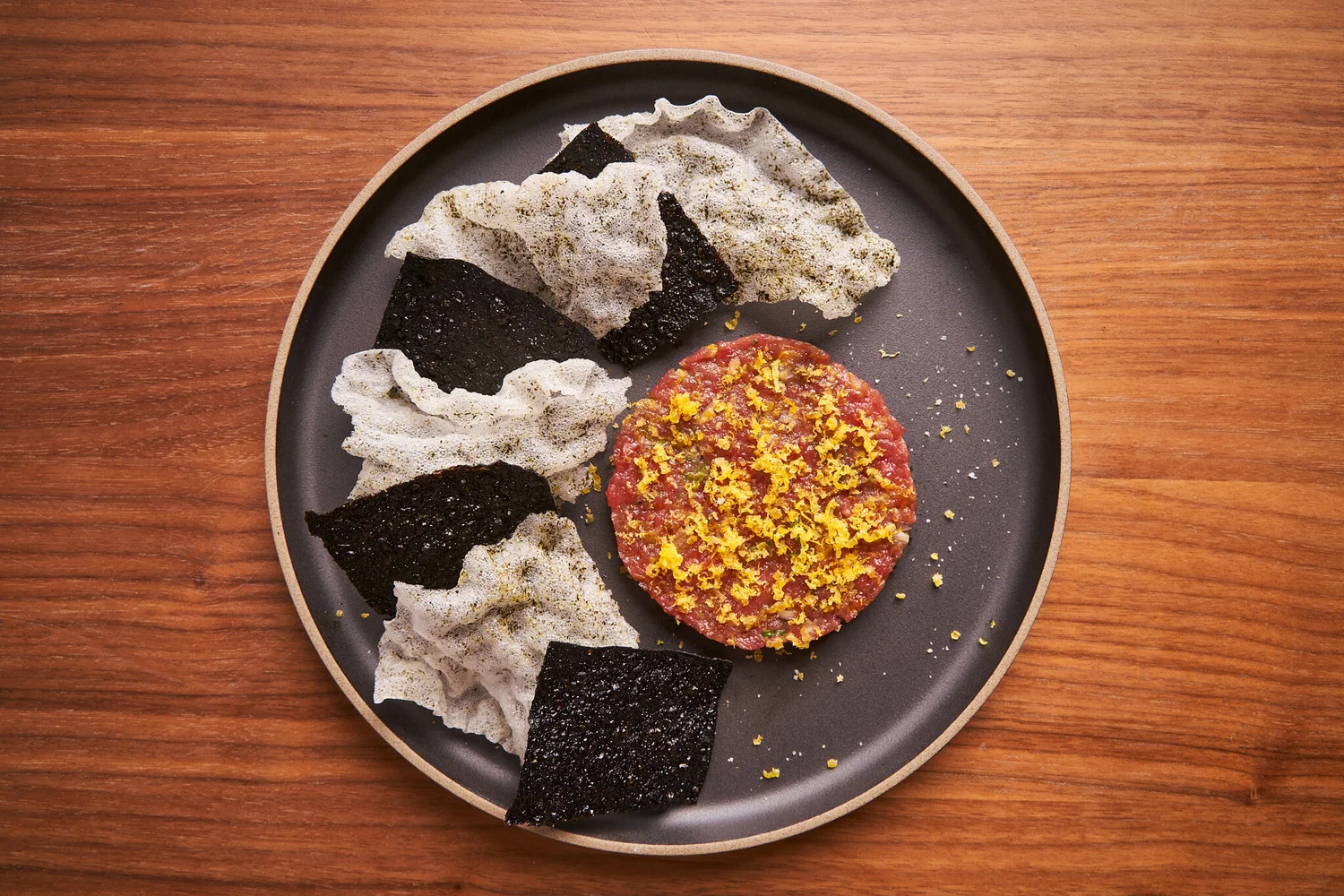 Beef tartare with cured egg yolk and nori rice crisps at 8282, the Michelin Bib Gourmand Korean fusion restaurant on the Lower East Side