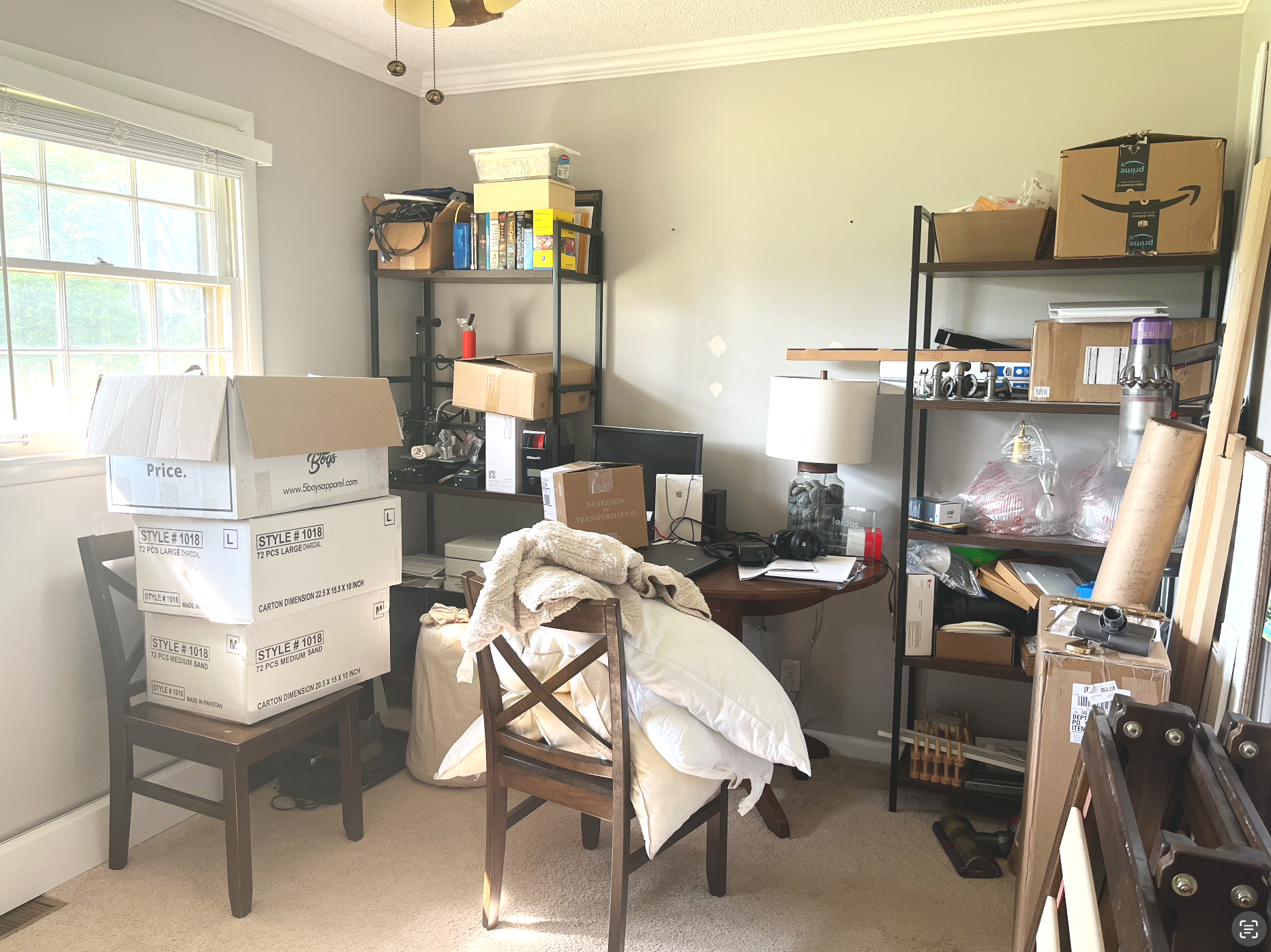 image of a home office space full of boxes in need of being decluttered