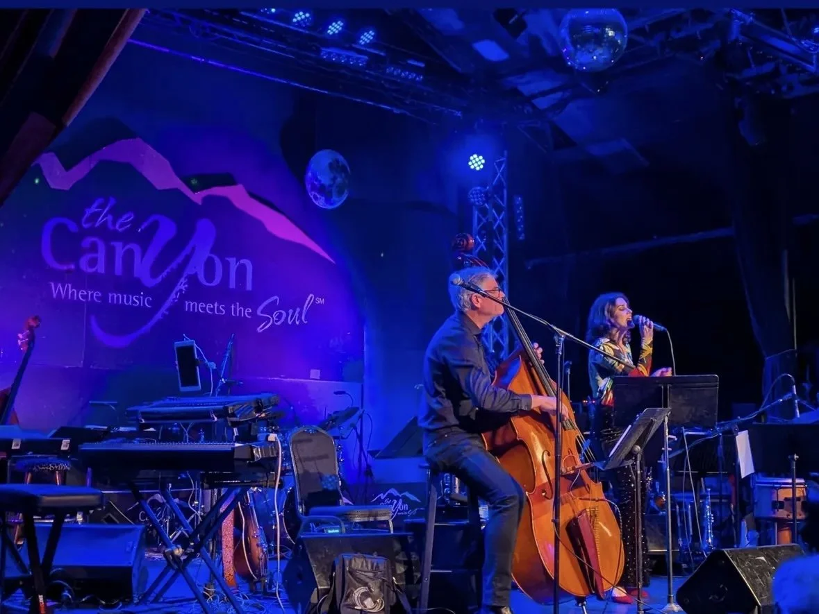 Kalen and her father, bassist and producer Trey Henry, performing live.