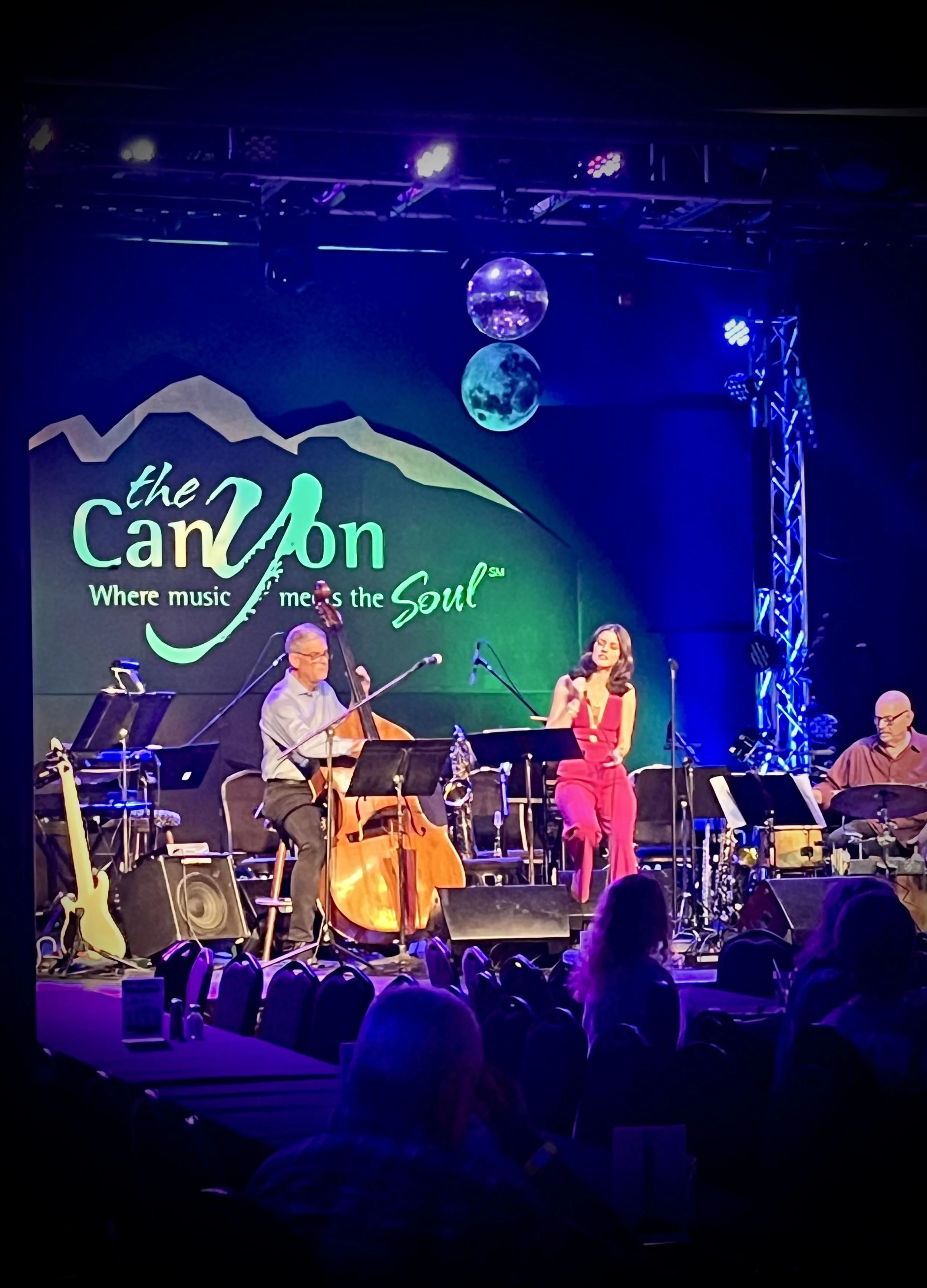 Kalen and her father, bassist and producer Trey Henry, performing live.