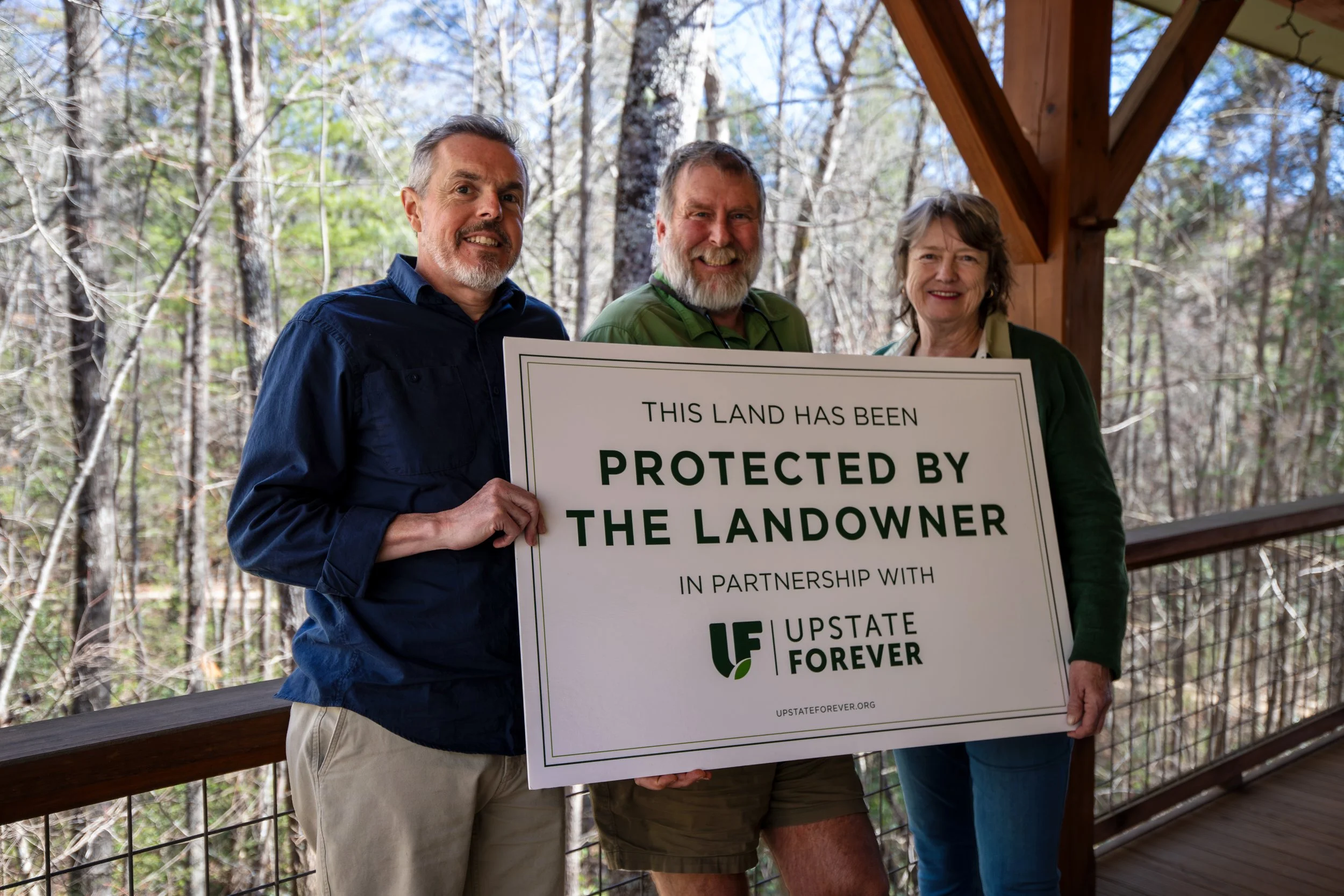 UF Land Conservation Manager Chris Starker with landowners Jody Tinsley and April Childress