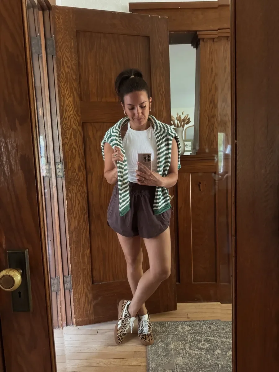 On-the-Go Outfit Idea: Elevated Activewear with Layered Tank, Striped Cardigan &amp; Statement Sneakers