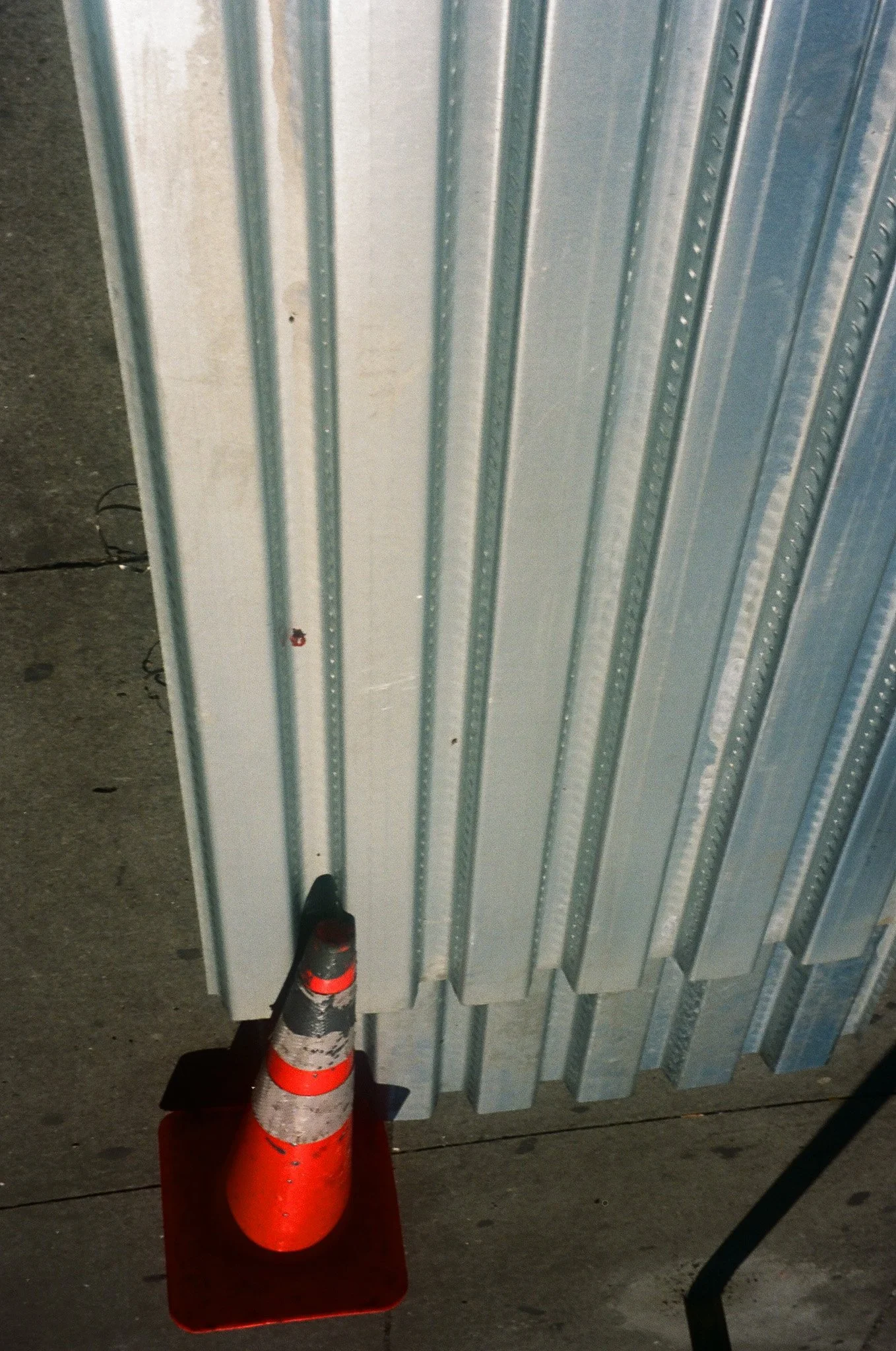 nyc fashion photographer Sam Bates of indie studios, a creative production studio based in Brooklyn, photographs a still life on the streets of New York City using film photography to collage into magazine editorials and campaigns