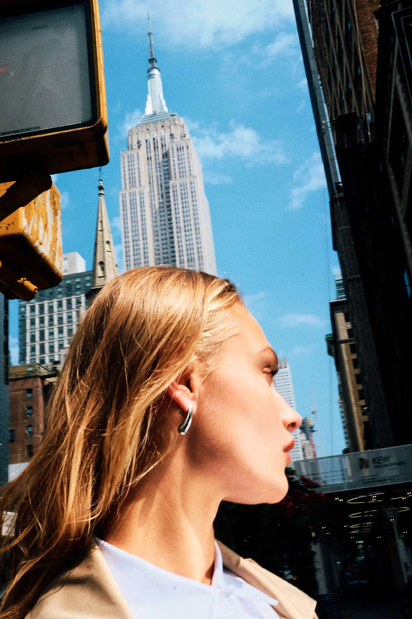 Nostalgic women’s fall fashion campaign photographed on film by NYC fashion photography duo Indie Studios on New York City street features iconic NYC landmarks   inspired by gritty 90s fashion editorial photographer Peter Lindbergh