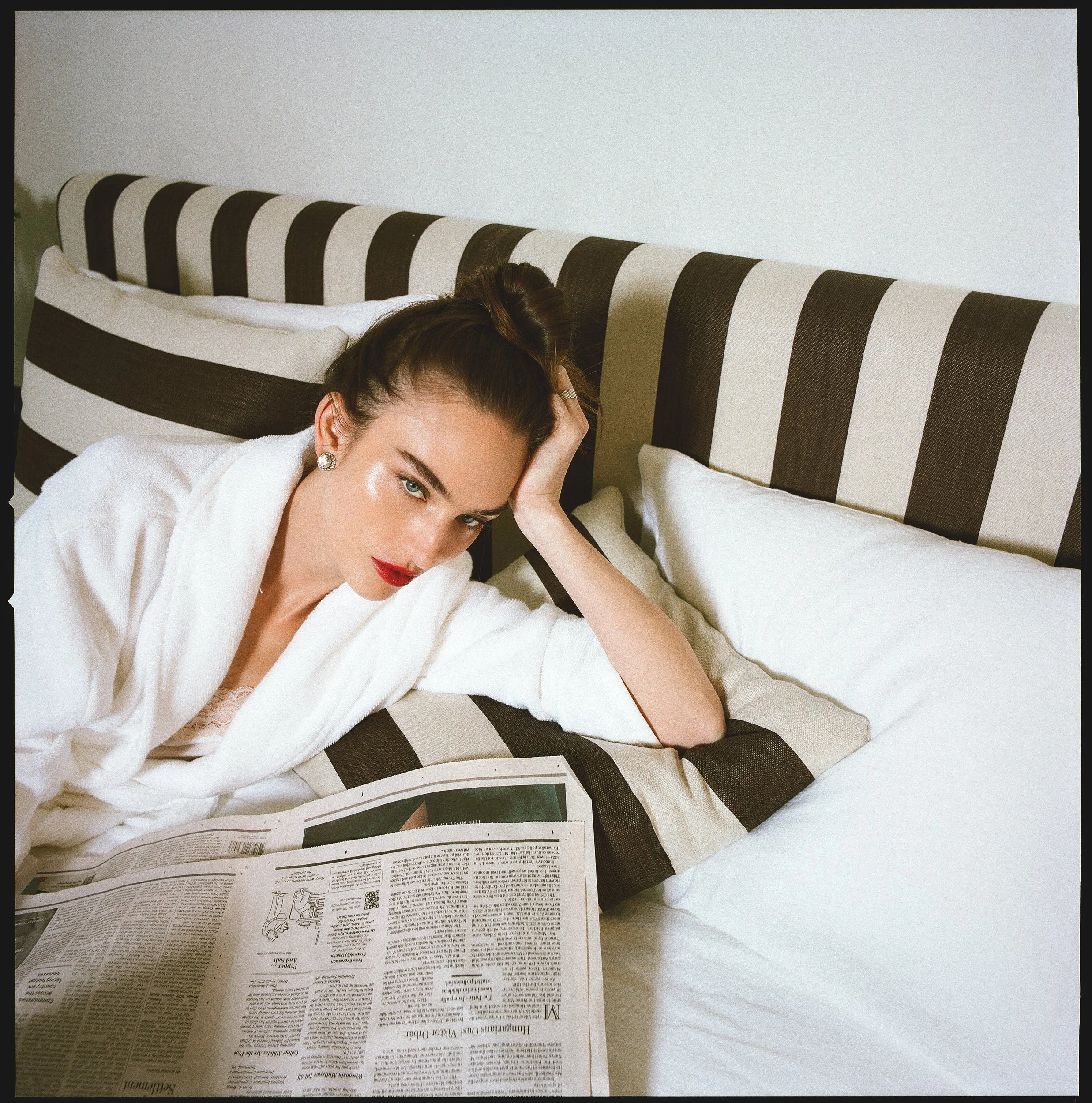 advertising campaign featuring fashion model in diamond earrings fine jewelry campaign nostalgia of 90s vogue editorial directed & photographed on film  in a style both gritty and timeless by Indie Studios in New York City