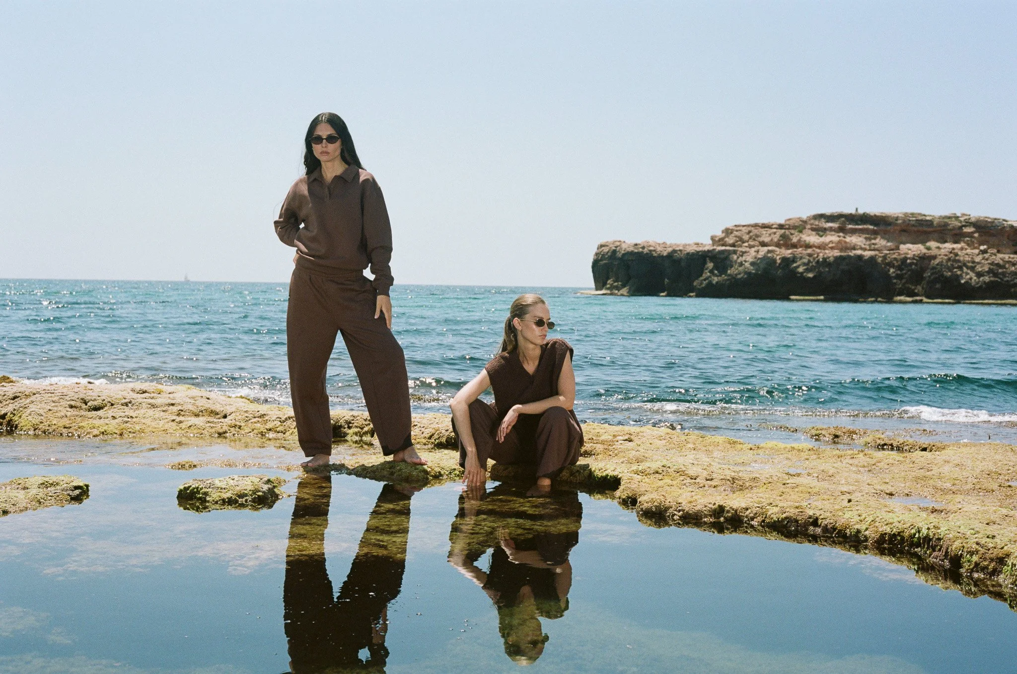Iolanta poses in Europe on location for fall winter fashion campaign inspired by the clean minimal film photographs of iconic brand jil sander. based in nyc, indie studios travels to photograph, direct, & produce fashion editorials and campaigns