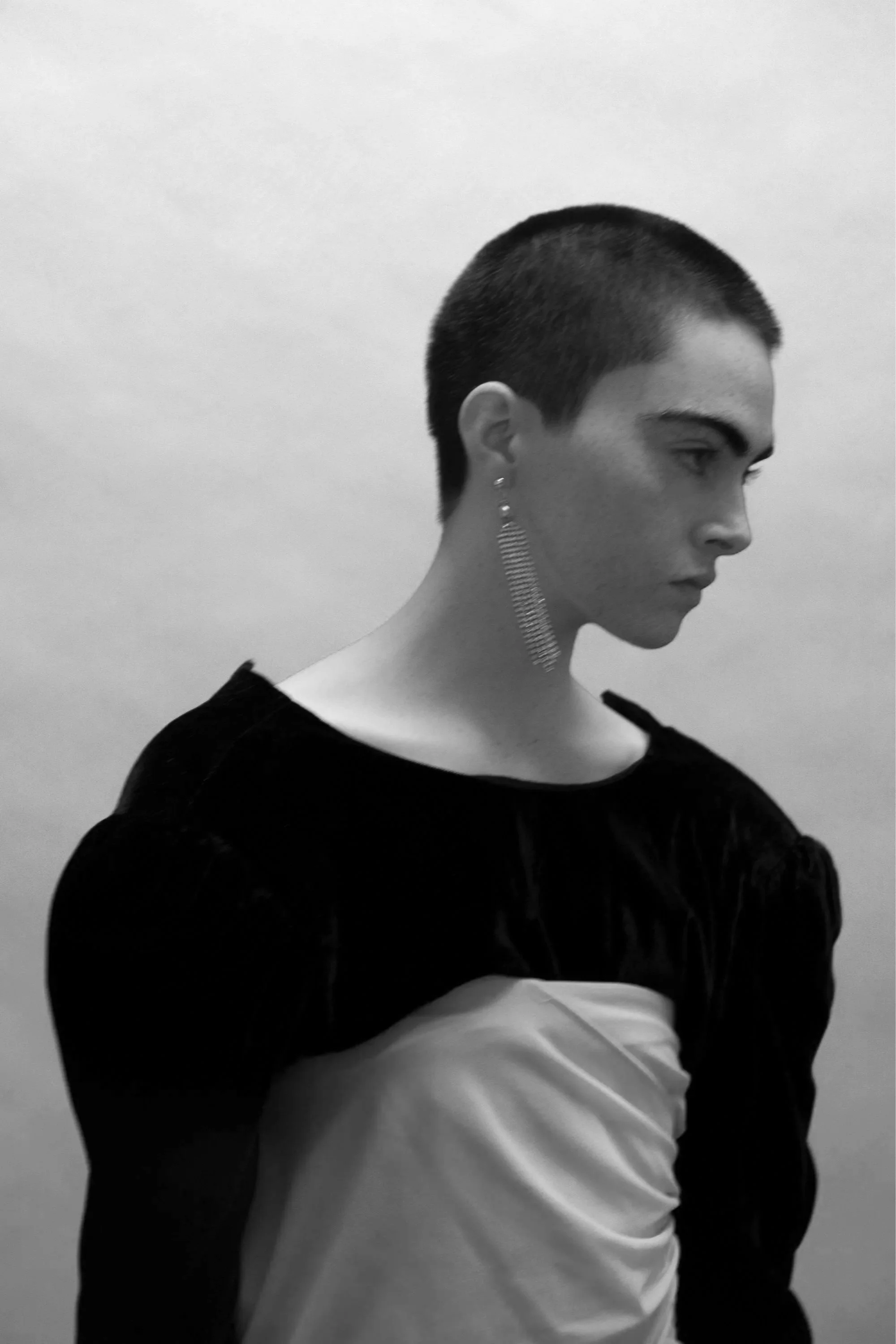 Shane Stevens, high fashion runway model for Collina Strada, photographed in timeless fashion campaign Indie Studios artist duo Andrew White & Sam Bates, their clean but gritty film photography is inspired by Irving Penn.