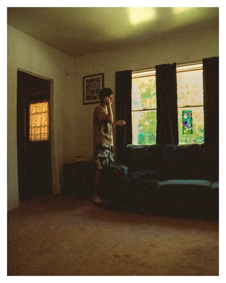 Cody on the phone with his dad, 2011