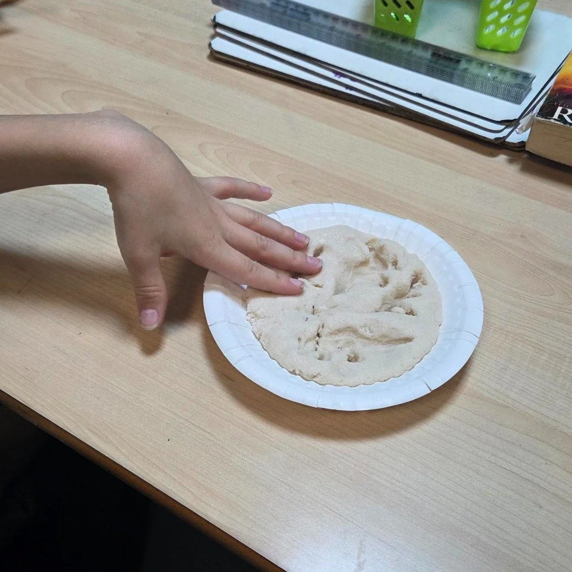 Kestrels and Merlins have spent the afternoon investigating how fossils are made. They have recreated the fossilization process by imprinting toy dinosaurs into play-dough and filling the cavity with Plaster of Paris. They will then become paleontolo