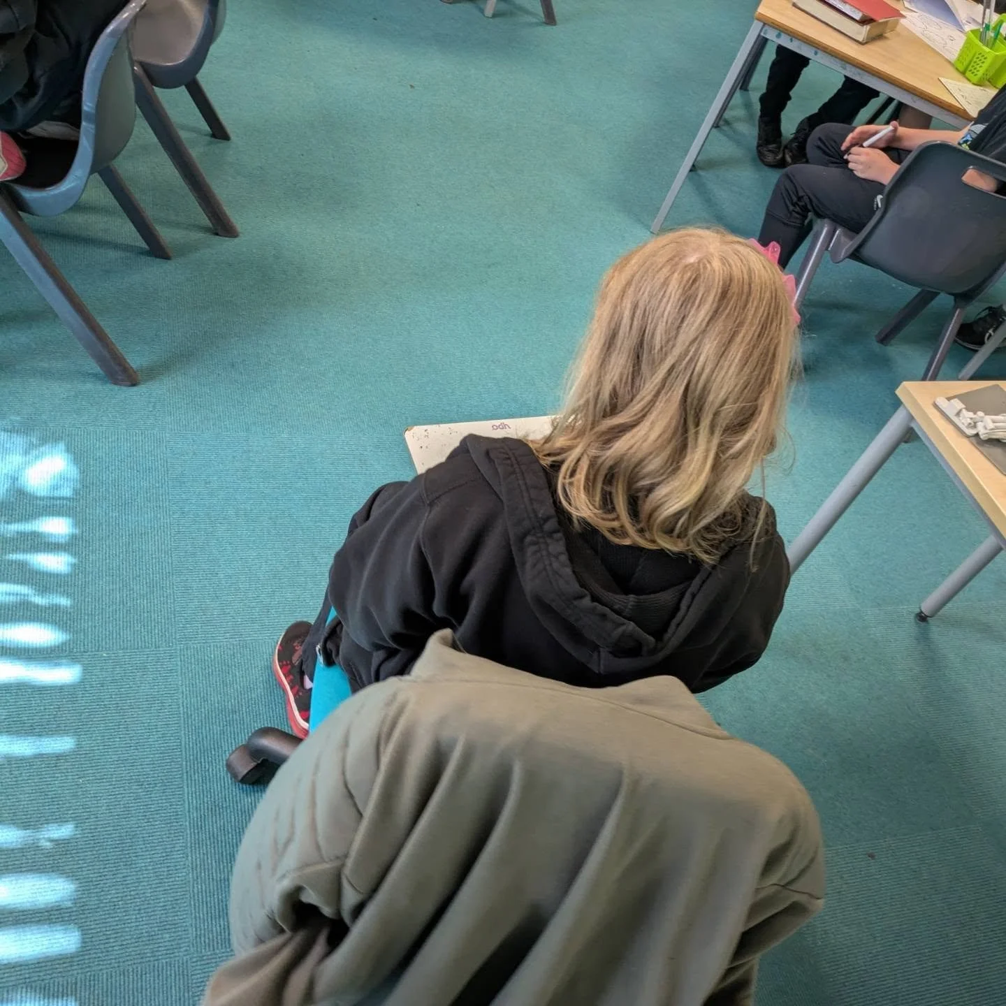 Today Year 5 followed on from their Riot Act workshop a few weeks ago, where they started to work on their travel cup campaign. Today they put each other in the hot seat to explore possible reasons for people's travel choices.