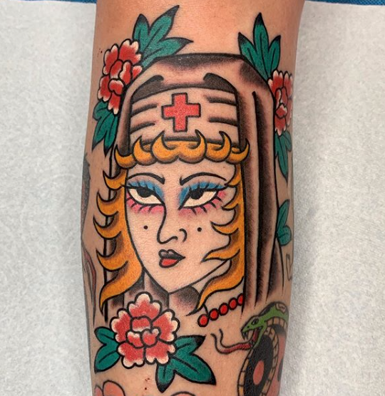 Lucky Bella Tattoos - We adore this traditional nurse tattoo by Brooke Cook  here at Lucky Bella Tattoos in North Little Rock, Arkansas.  @brookecooktattoos To book an appointment go to www.tattooarkansas.com . .  . . . . . #
