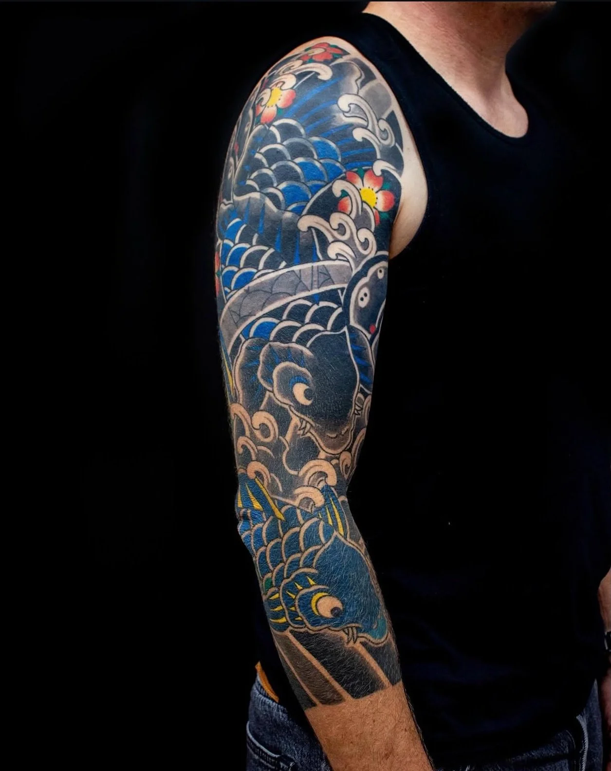 Tribal coverup with a 3/4 koi sleeve by @horiyama_ 

To book with @horiyama_ you can head to her website and fill out an inquiry form, or get in touch with us:

info@sunsettattoo.co.nz
www.sunsettattoo.co.nz

#sunsettattoonz #aucklandtattoo #japanese