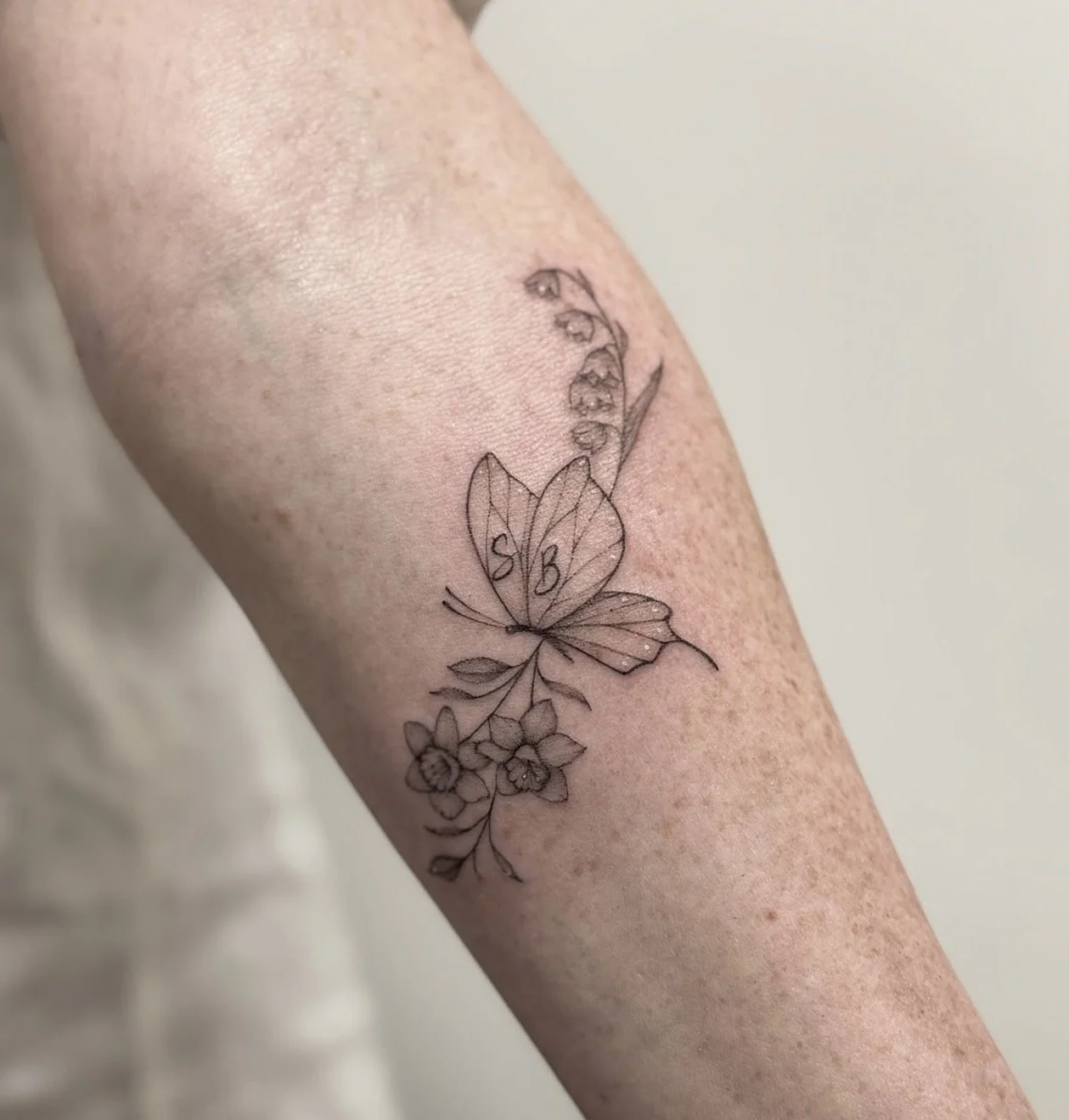 fine-line-butterfly-floral-tattoo-auckland.jpg