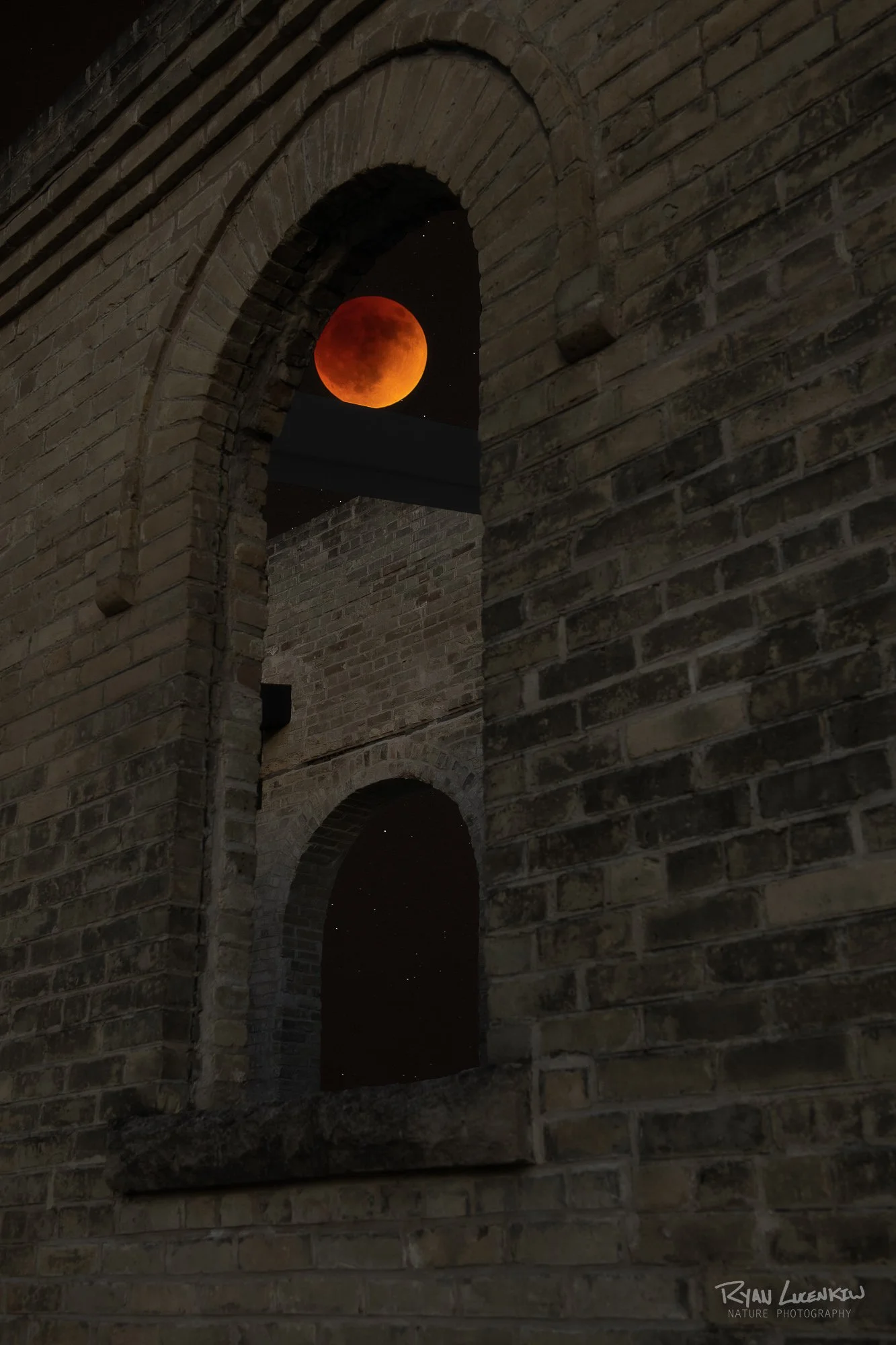 This image is a composite inspired by the elements around me while shooting. There are three photos combined. The building, moon, and stars.