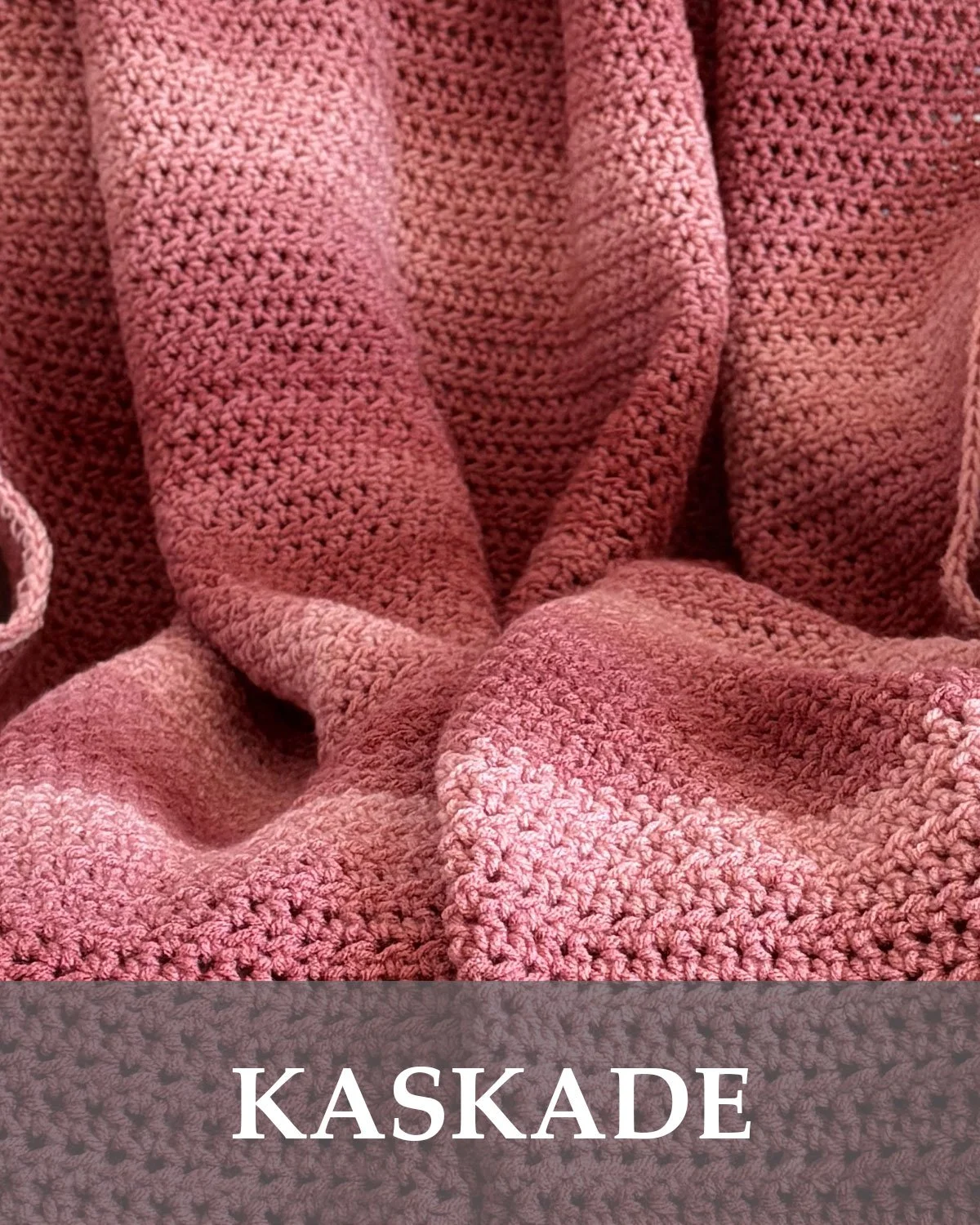 Handmade Kaskade crochet throw blanket in pink and rose ombre