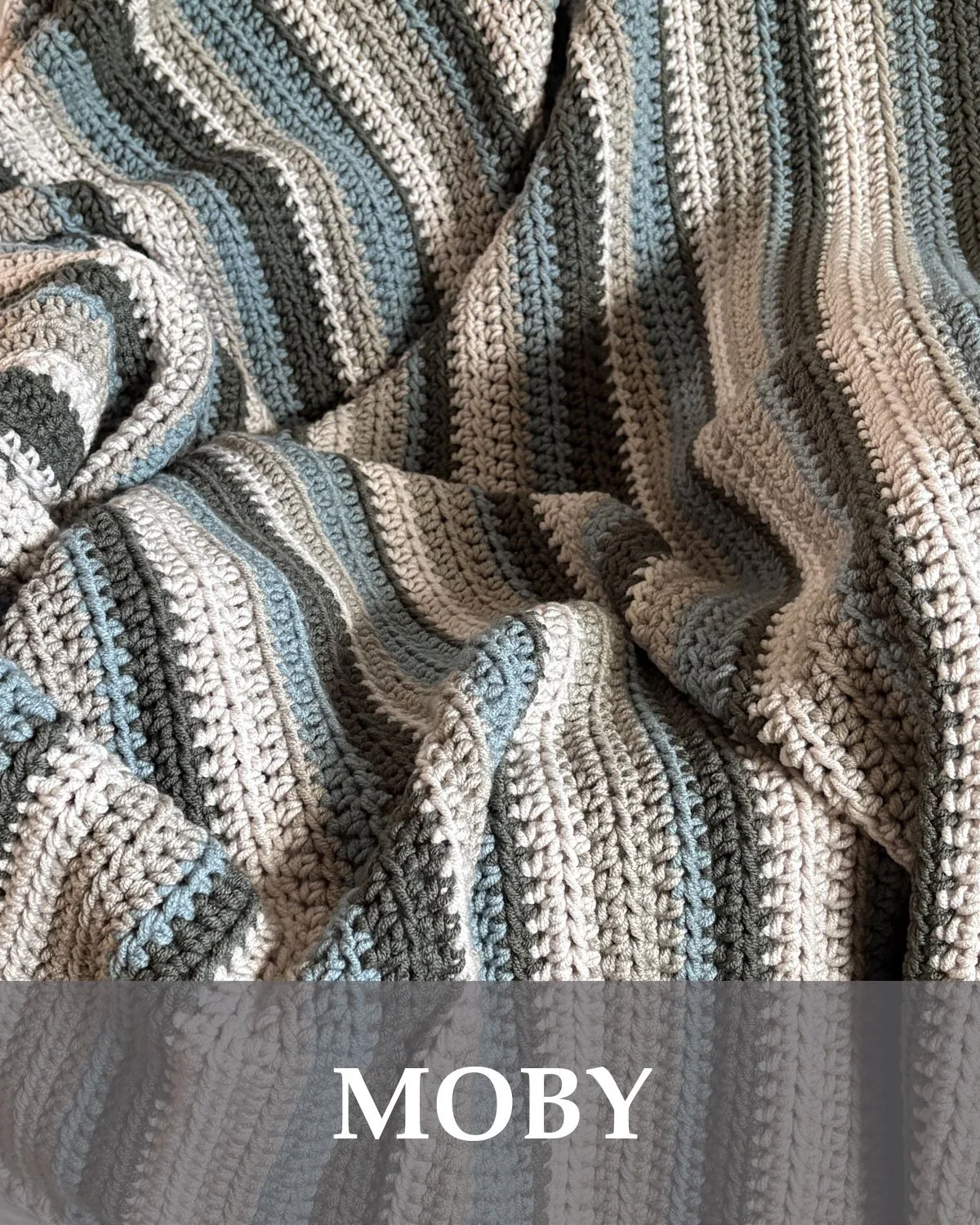 Handmade crochet throw blanket featuring a cream, blue, birch and dark green striped design. Each blanket is crocheted by hand and makes a cozy one of a kind addition to a bedroom, living room, or reading space. Approximately 52" x 67"