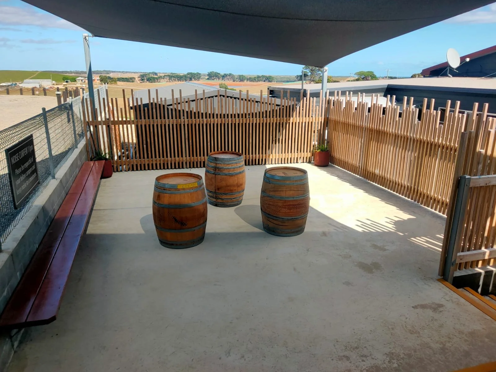 Campers out back with barrels.jpg