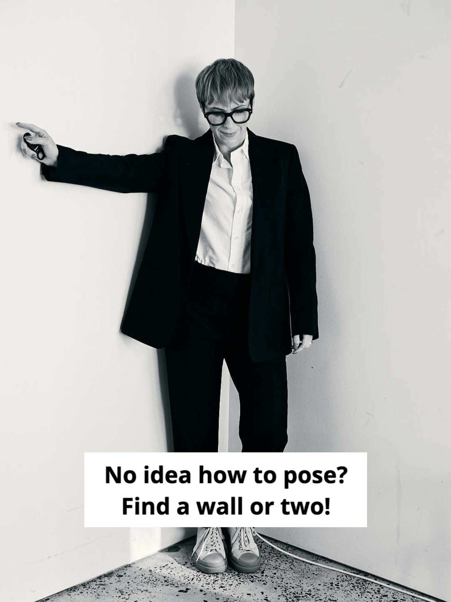 If you freeze in front of the camera and think, &ldquo;What do I do with my body?&rdquo; &mdash; start here.

Find a wall.
A corner.
Something solid to lean on.

Walls take the pressure off. They give your body support, create shape, and instantly ca