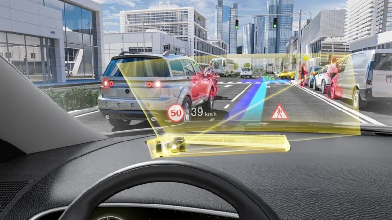 Scene 2: Surf's Up
VO: “Hang On”
Description: Camera flies into a vehicle with a surfboard attached on top and we instantly see the HUD dashboard display showing real-time traffic and pedestrian traffic. Our talent hard shifts the van as it speeds aw