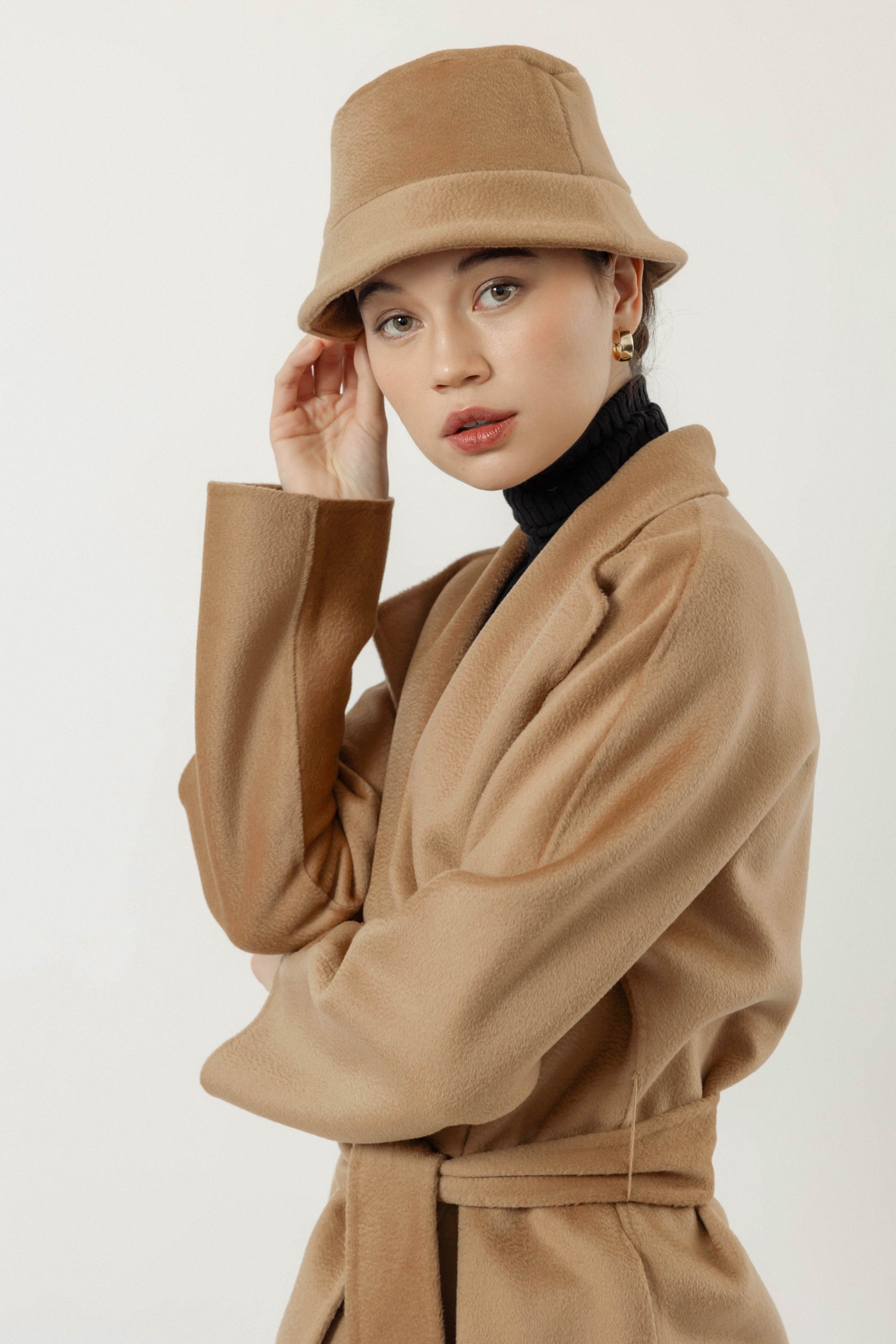 Camel Sloan tight side with hat.jpg