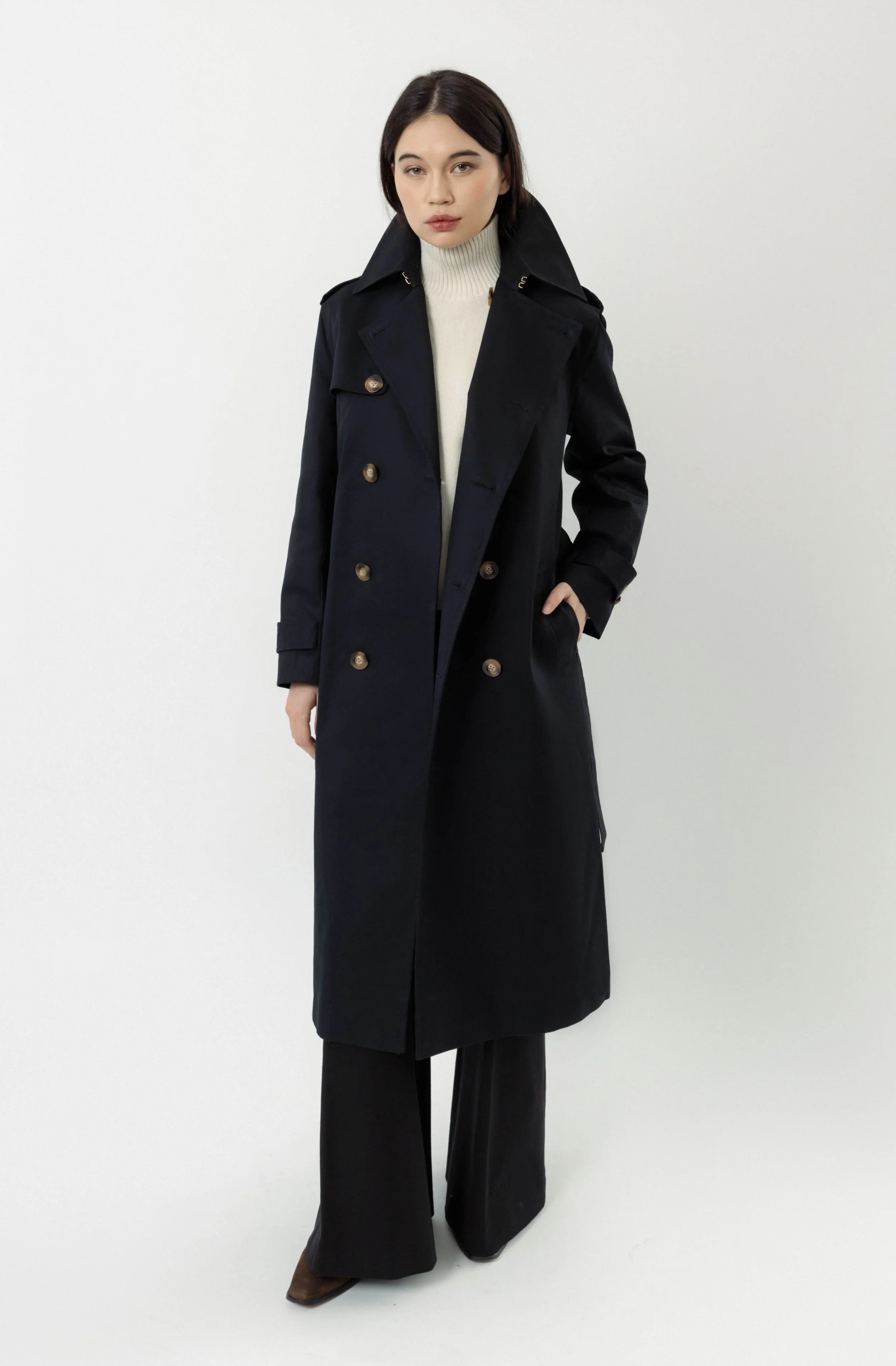 Roz x Heather Lynn trench coat in navy organic cotton, worn on model with Pamela Card jewelry
