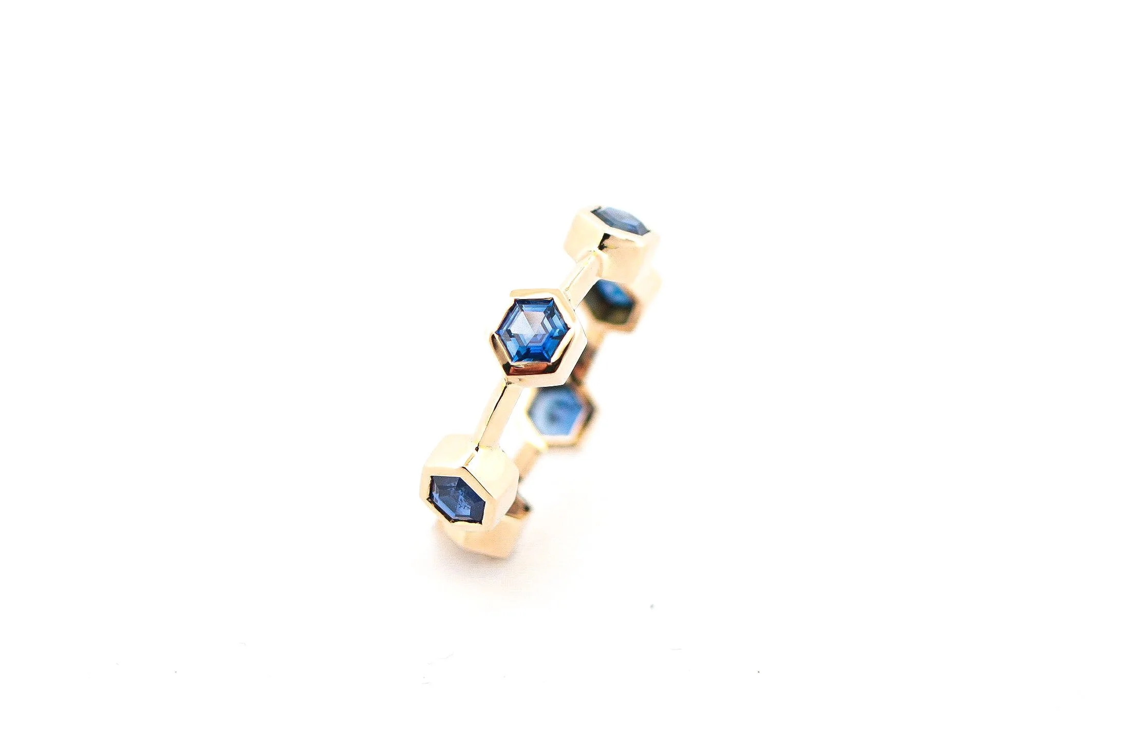 Bespoke Blue Hexagonal cut Sapphires as an Eternity Band