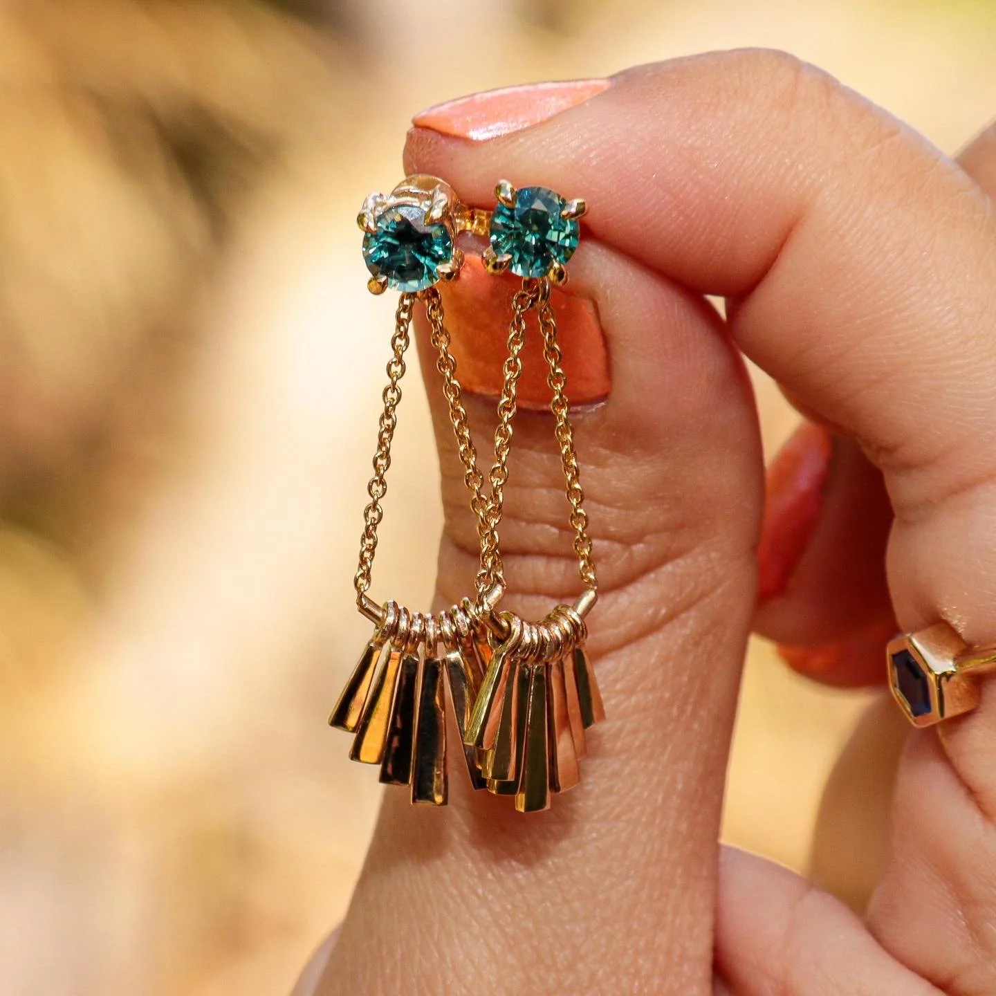 Bespoke Earrings Designed around two Australian Parti Sapphires. Can be worn as studs and has the option of attaching the Ray of bars 