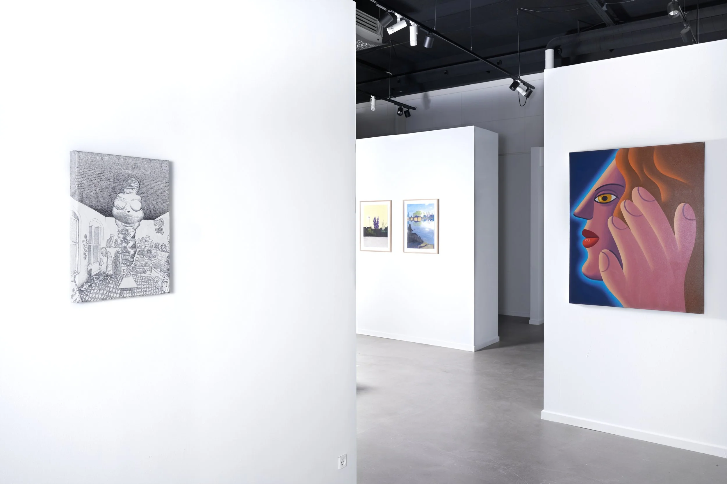 Art gallery with white walls displaying various paintings, including a detailed black-and-white piece on the left, two landscape pictures in the center, and a colorful portrait of a woman on the right.