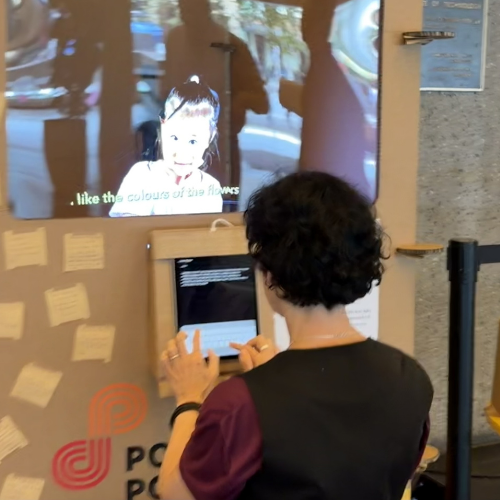 Woman typing a promise into the Possibility Portal