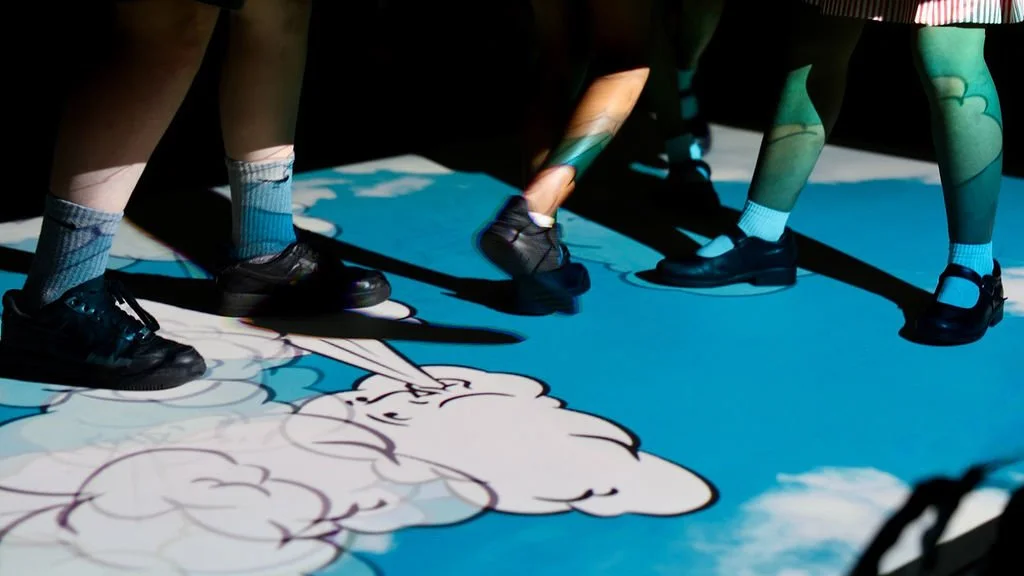 feet on an interactive projection