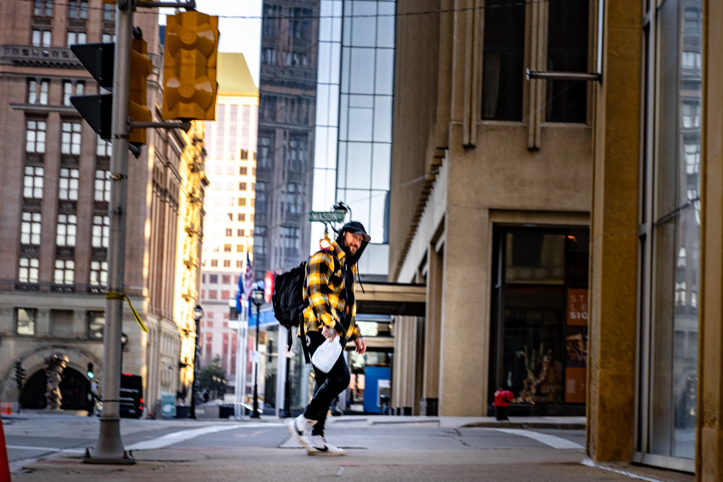 milwaukee nov 22 man walking on street.jpg