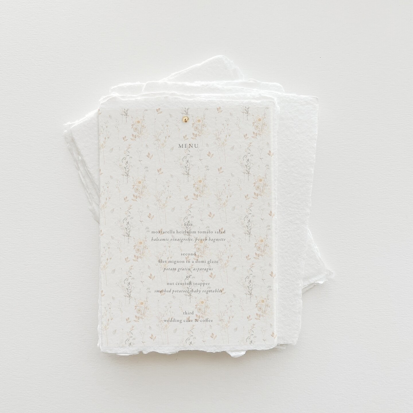 Handmade menus with beautiful vellum overlays will always be the prettiest option!