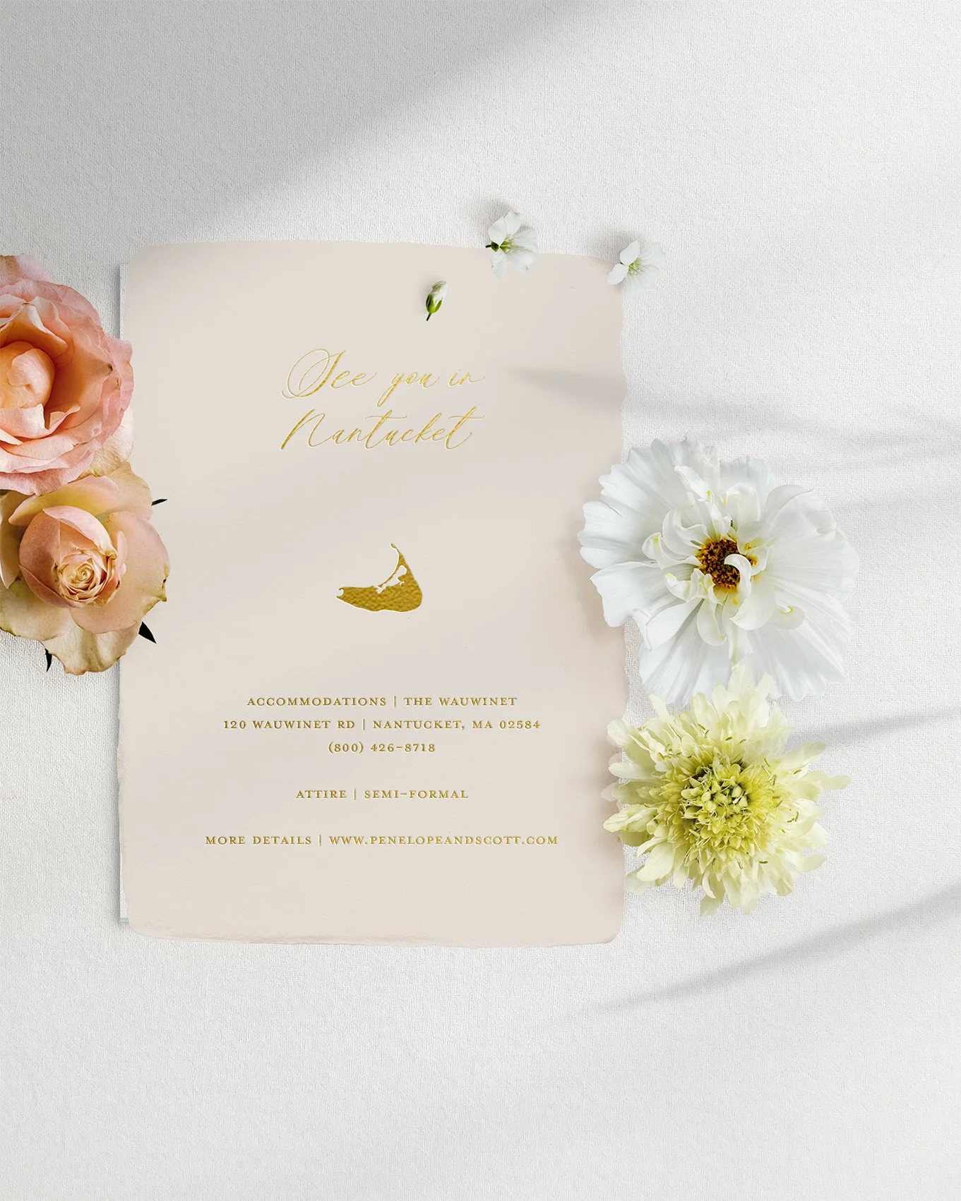 Invitation with the text 'See you in Nantucket' held on a white surface, decorated with pink and white roses and a white flower with yellow stamens.