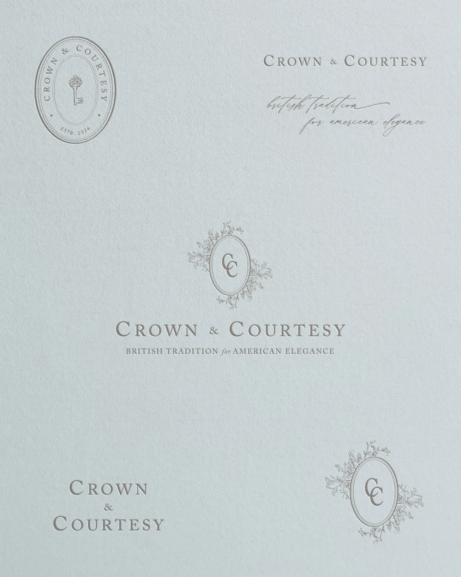 Cream-colored envelope with embossed Crown & Courtsey logo, text reading "British tradition for American elegance," and decorative elements.