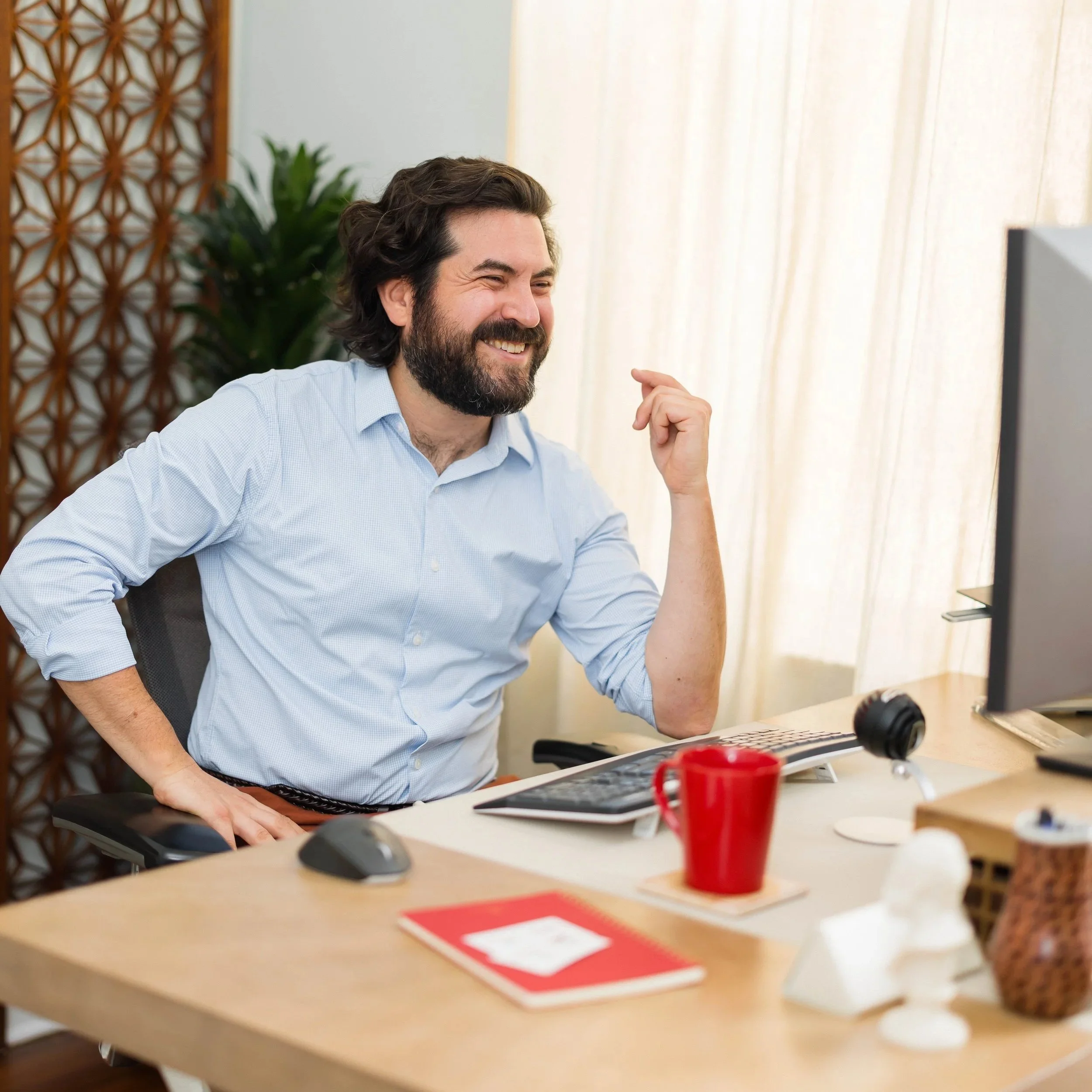 Gabriel Kuris laughing on a teleconference