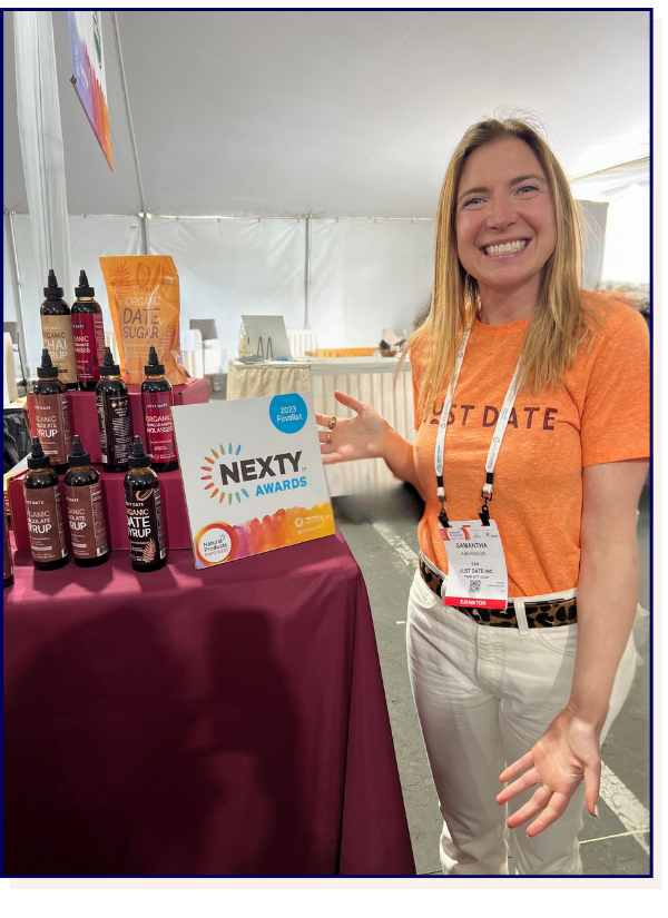 Food founder showing off her products