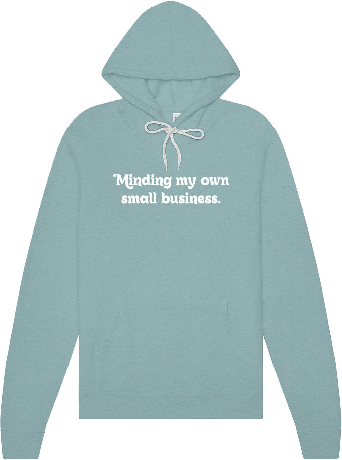 Light blue hoodie with white drawstrings and the text 'Minding my own small business.' printed on the front.