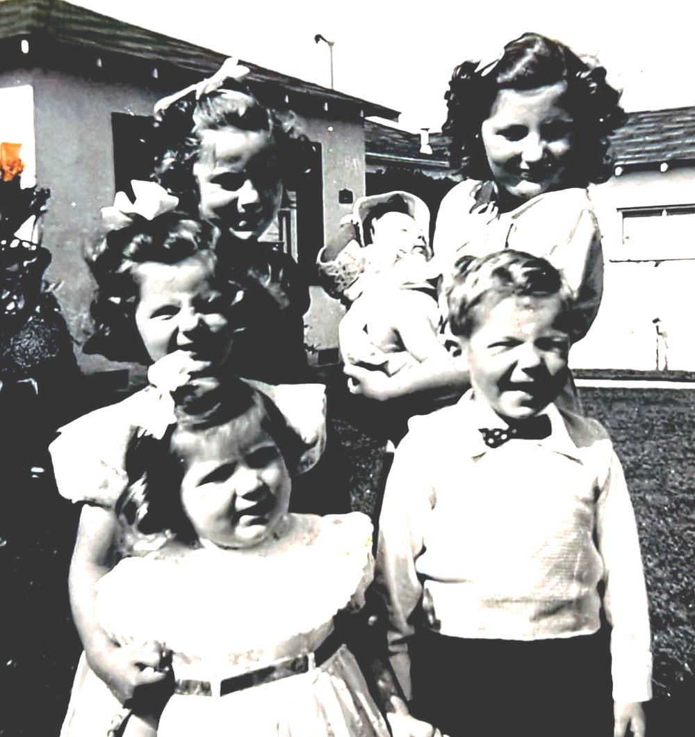 Judy (top left) and her siblings
