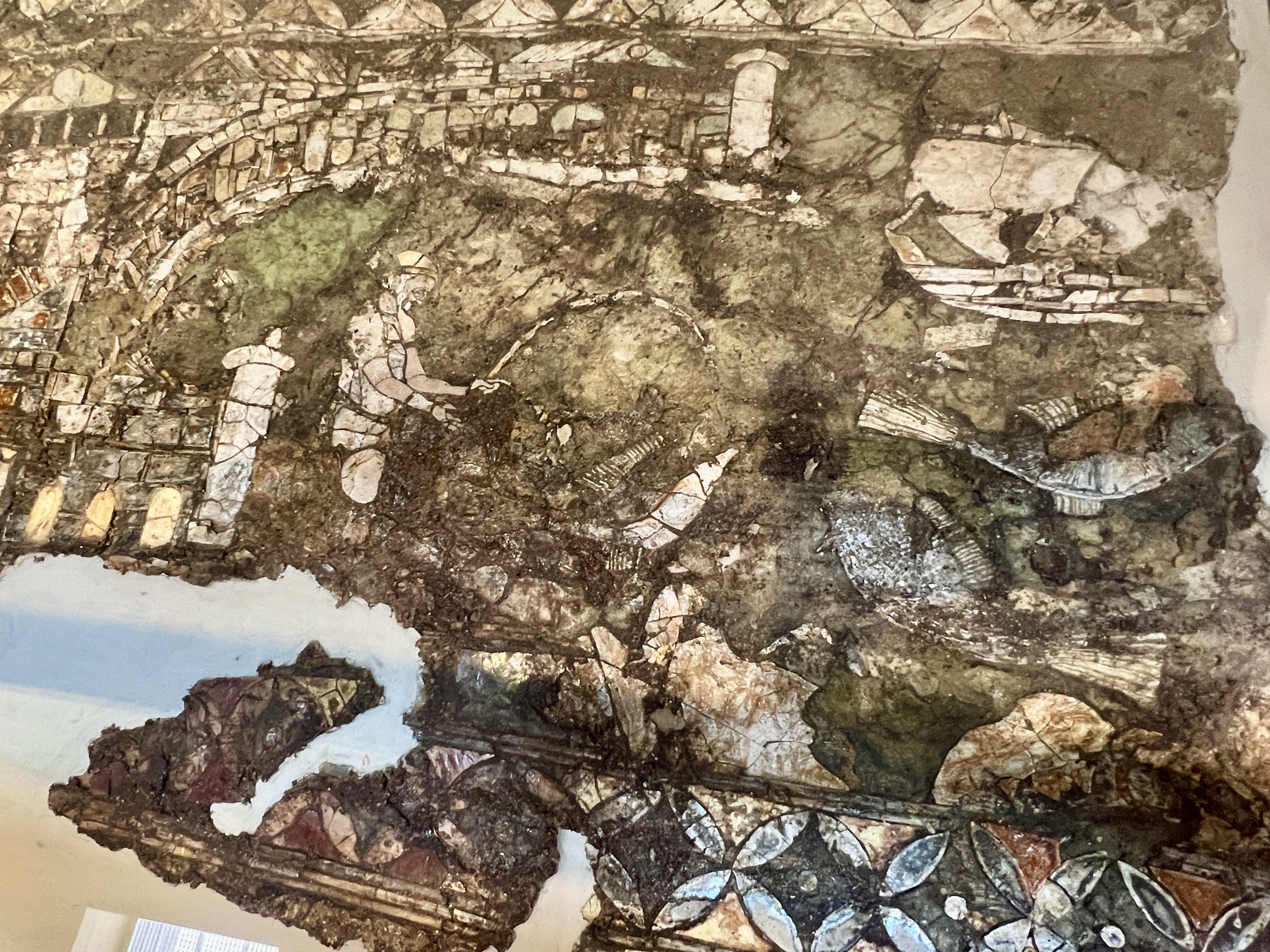 More of the glass mosaic depicting fishing at the harbor